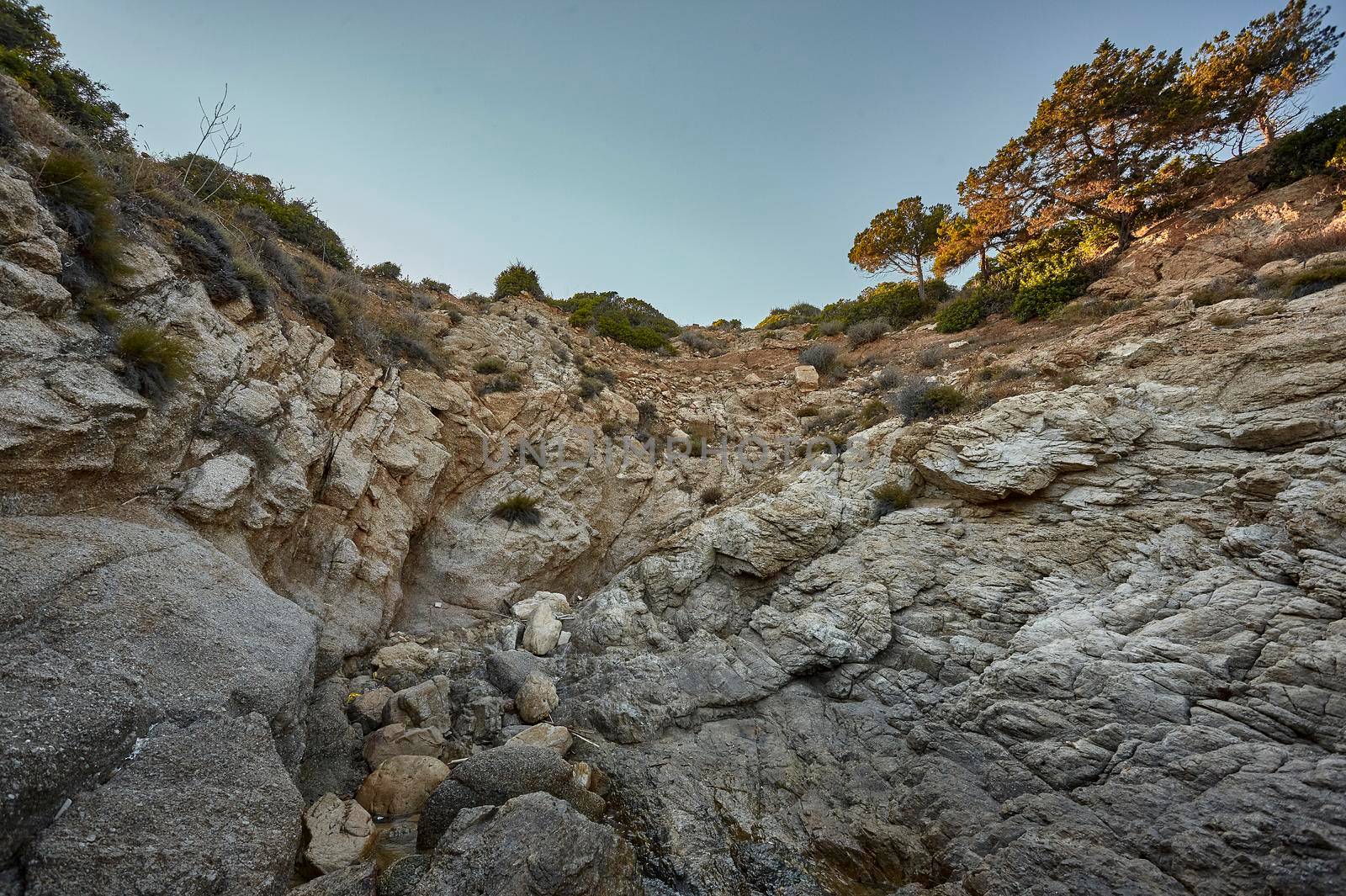 Rock face with a cliff typical of the areas of southern Sardinia.