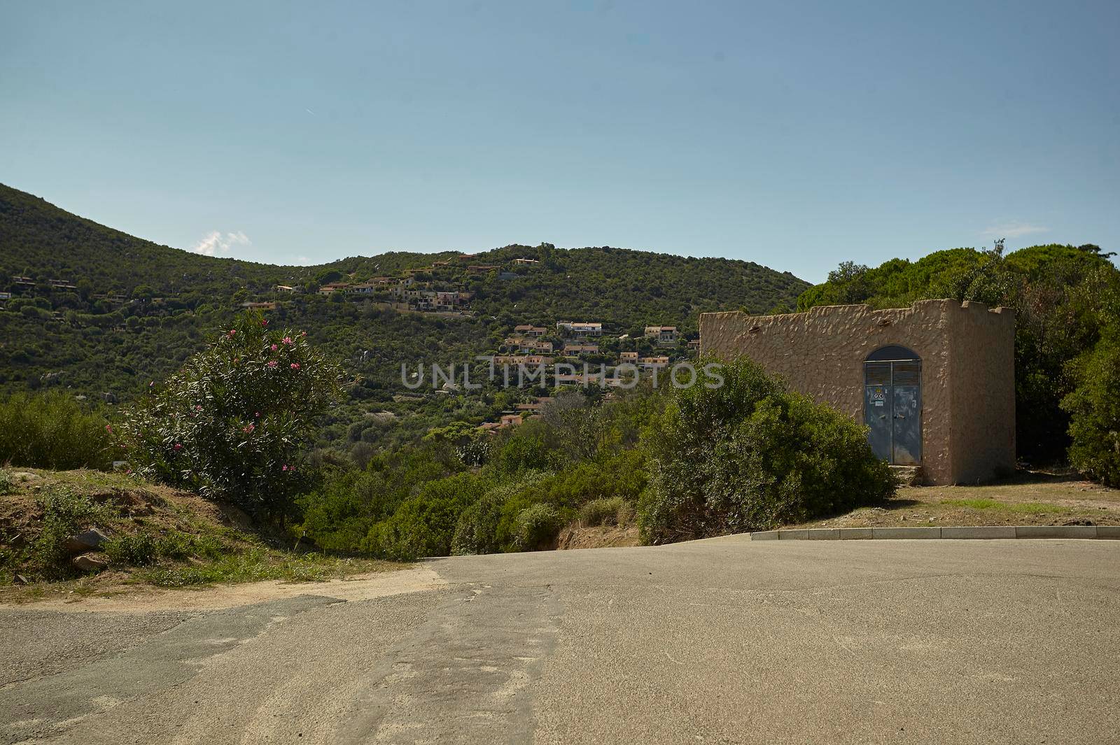 Panorama that showing the upper part of the village of Costa Rei seen from one of the streets that cross the village.