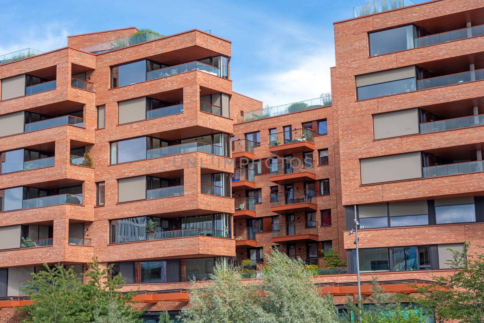 Modern red apartment buildings seen in Oslo, Norway