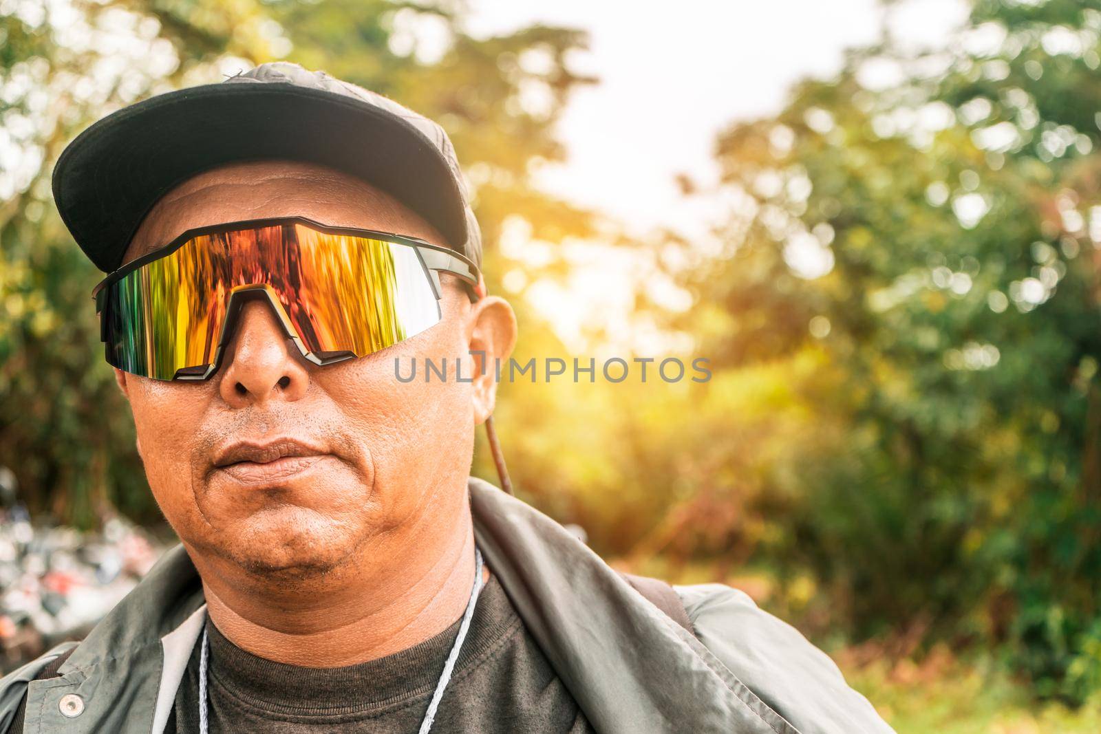 Portrait of an Indigenous man from the Miskito community in Nicaragua with glasses and motirized clothing