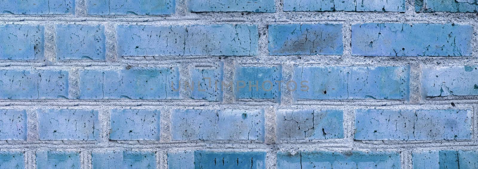 Banner background of an old brick wall, vintage brickwork texture, close-up, blue tinting by claire_lucia