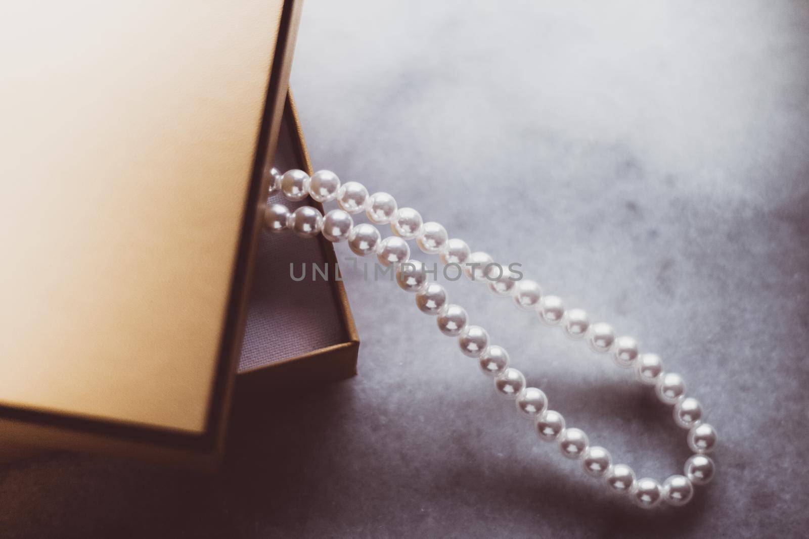Valentine's day ideas, luxury shopping and holiday inspiration concept - Pearl jewellery in a vintage golden gift box