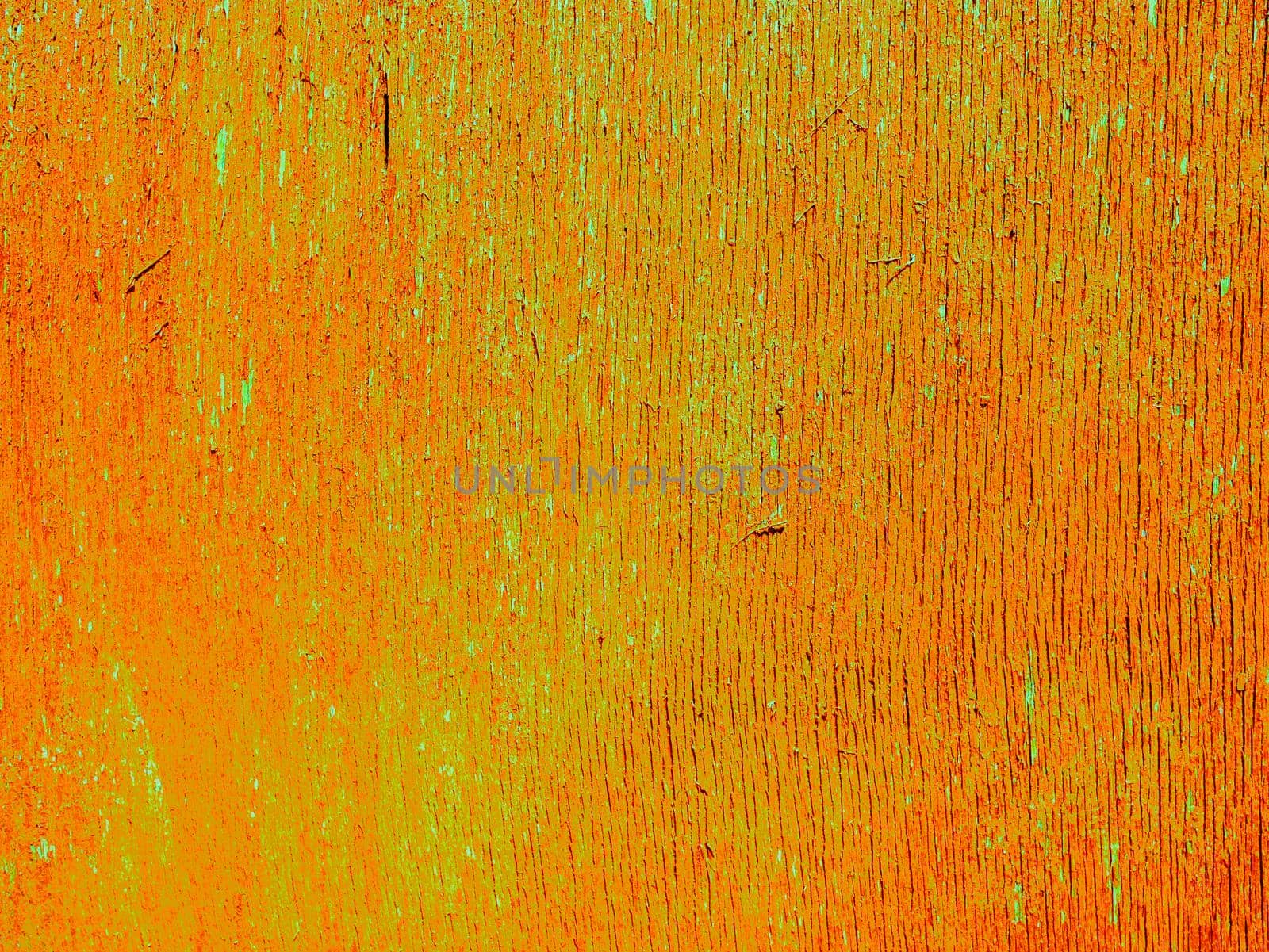 The surface of old plywood with orange paint faded from time to time.