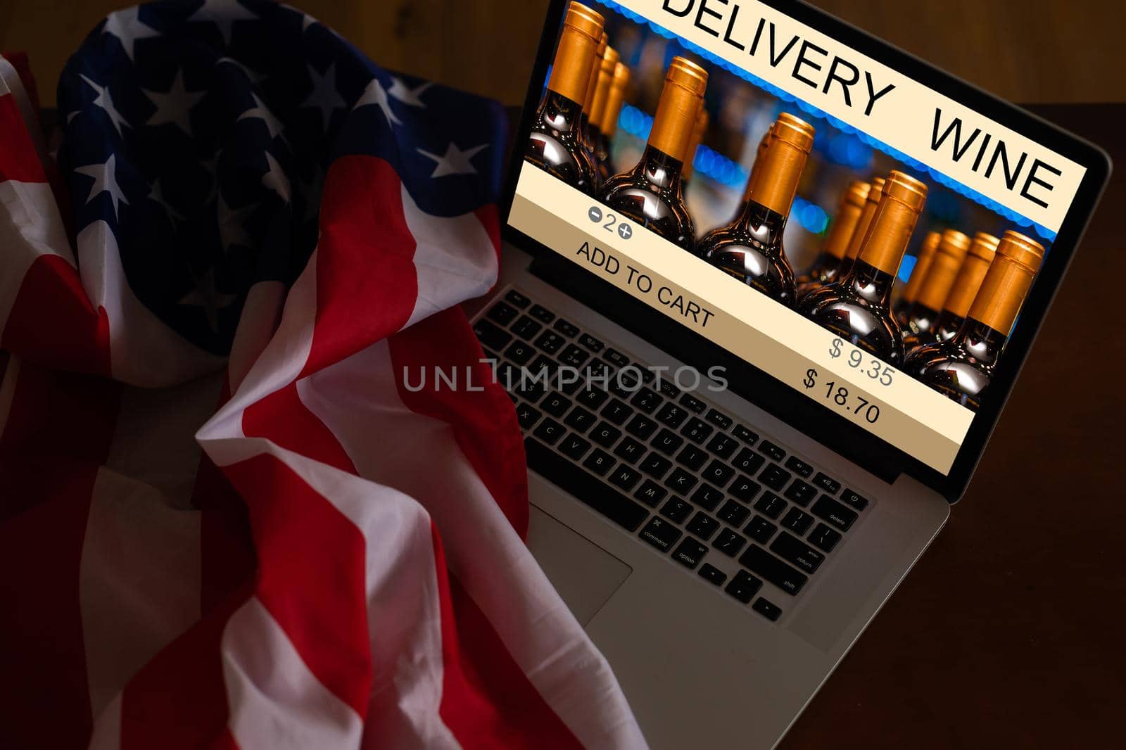 laptop with wine delivery and usa flag.