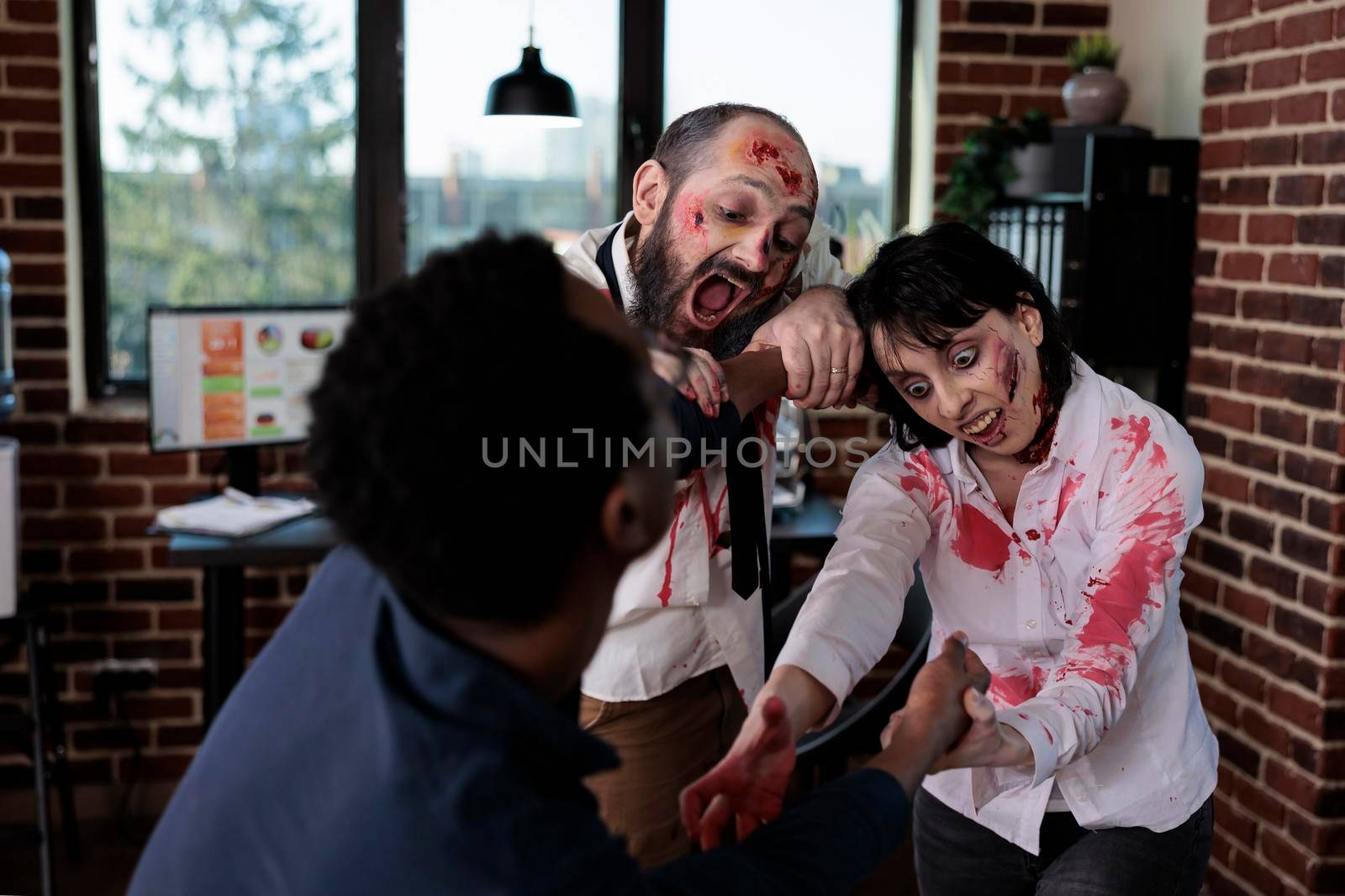 Creepy angry zombies chasing after businessman by DCStudio