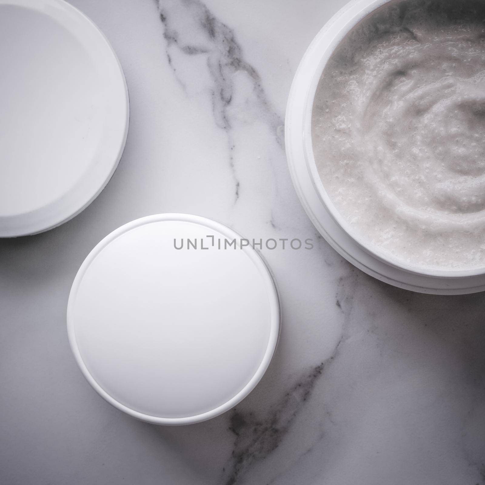 Skincare and body care, luxury spa and clean cosmetic concept. Health and beauty of your skin - Scrub and exfoliating cream products on a marble, flatlay