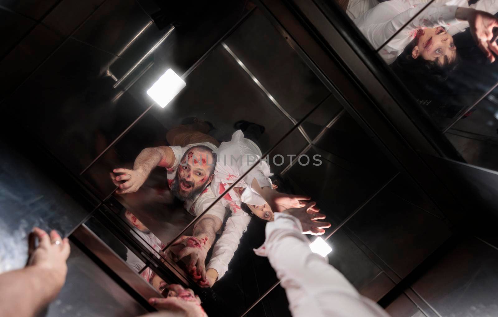 Dramatic aggressive walkers in elevator having bloody wounds and hunting people in company office. Brain eating devil zombie monsters chasing victims, creepy terror eerie massacre.