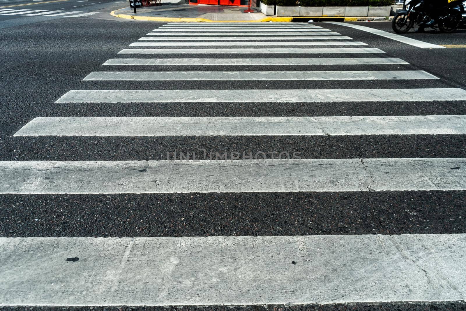 A Zebra crossing stripes on a road
