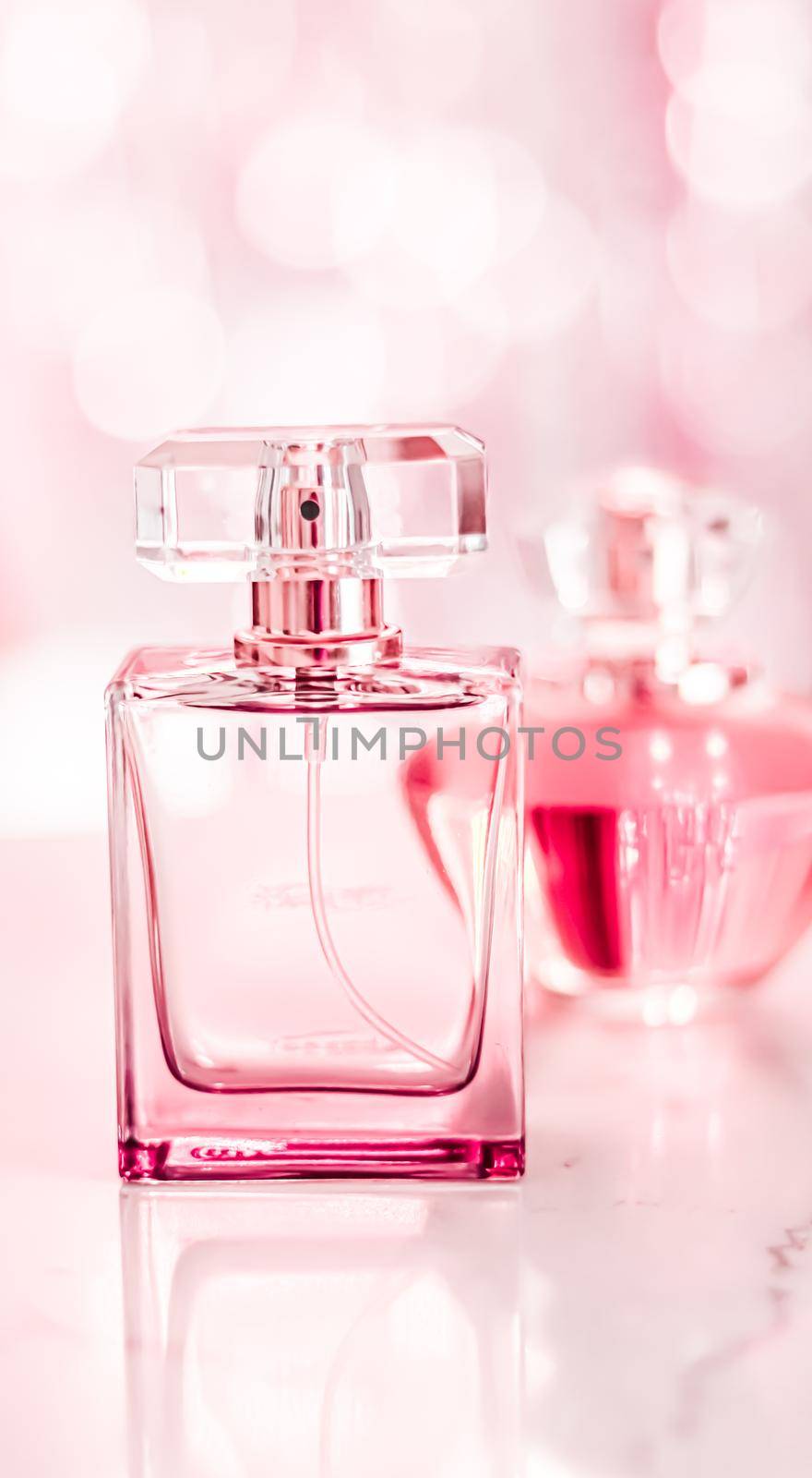 Perfume bottles on glamour background, floral feminine scent, fragrance and eau de parfum as luxury holiday gift, cosmetic and beauty brand present concept