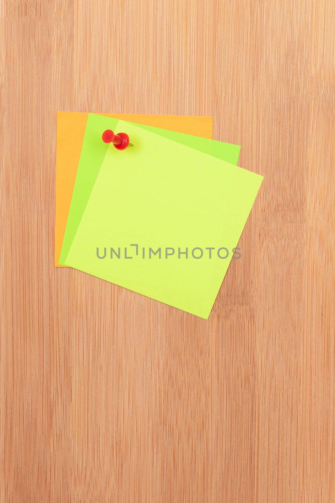 Colored Sticky Notes with Copyspace Pinned to the Wooden Message Board. To Do List Reminder in Office. Blank Memo Sticker at Work - Template. Empty Checklist - Mockup