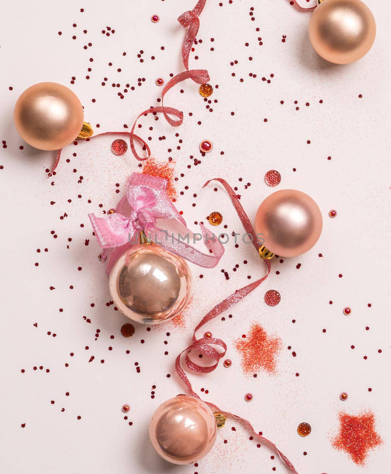 Christmas composition. Christmas balls and pink background. Flat lay, top view, copy space by Mariakray