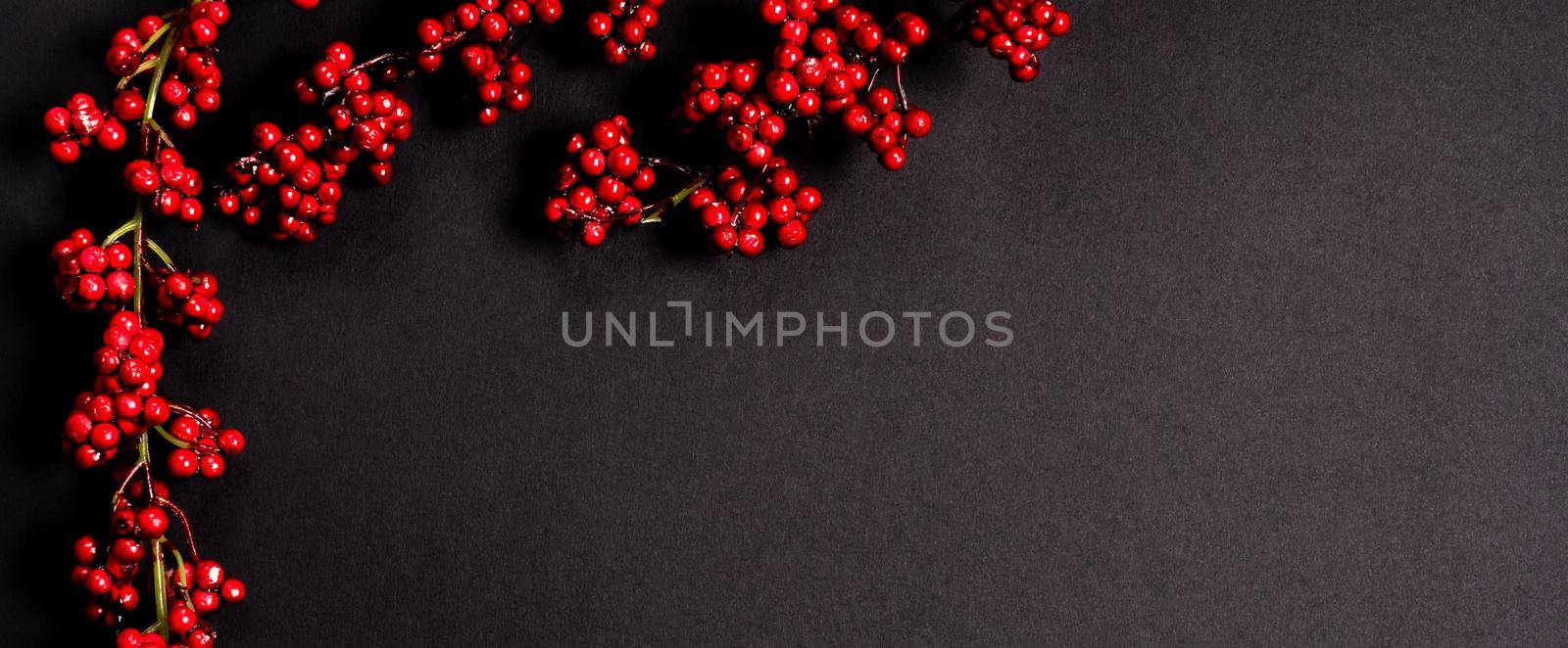 Artificial guelder-rose over black background, flat lay with copy space by Mariakray
