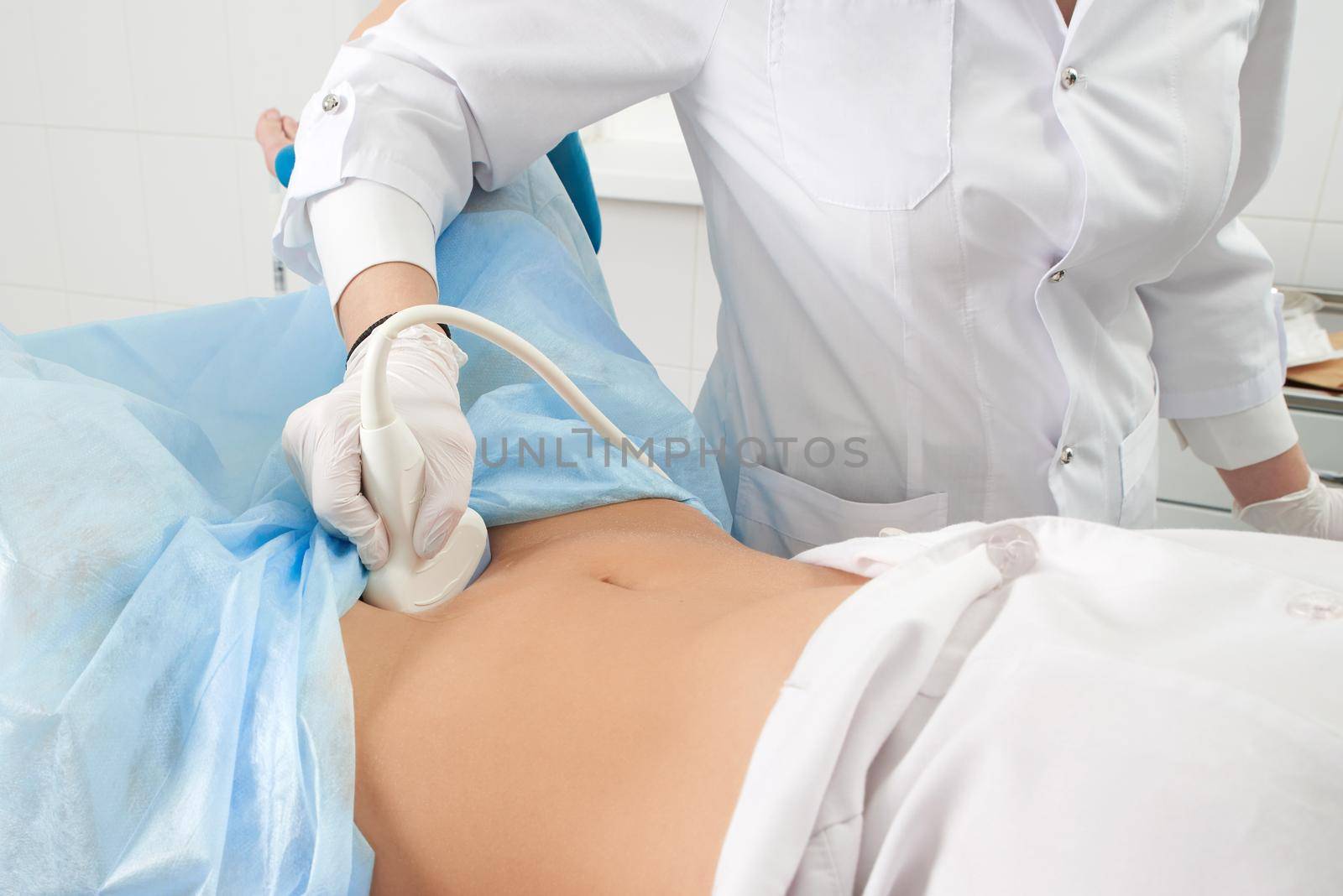 Cropped view of woman at gynecologist doing ultrasound exam