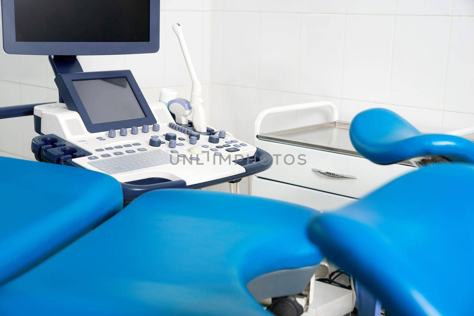 Empty Gynecological room with chair and equipment