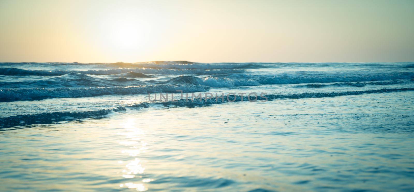 Landscape with sea sunset on beach.