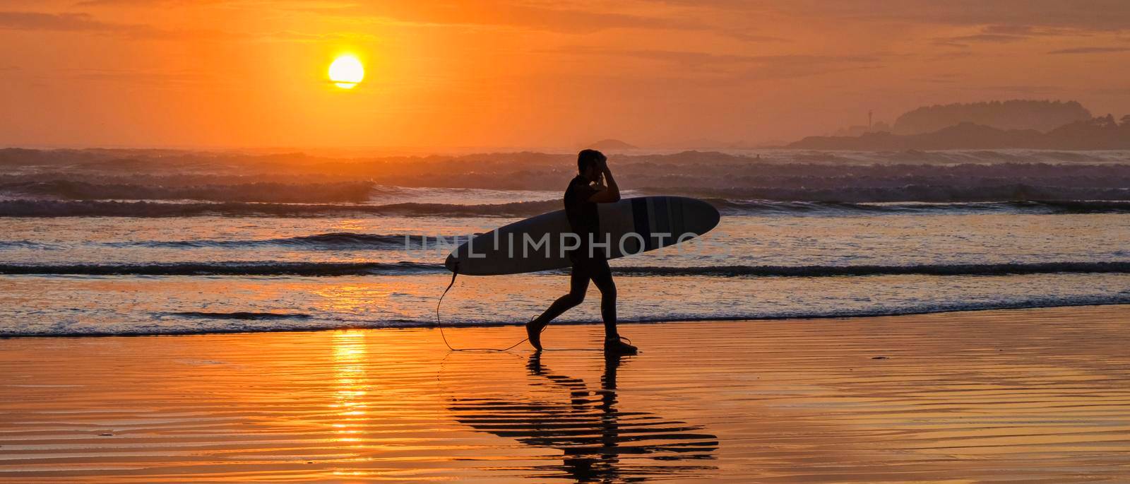 Tofino Vancouver Island Pacific rim coast, surfers with surfboard during sunset at the beach, surfers silhouette Canada Vancouver Island Tofino Vancouver Islander Island