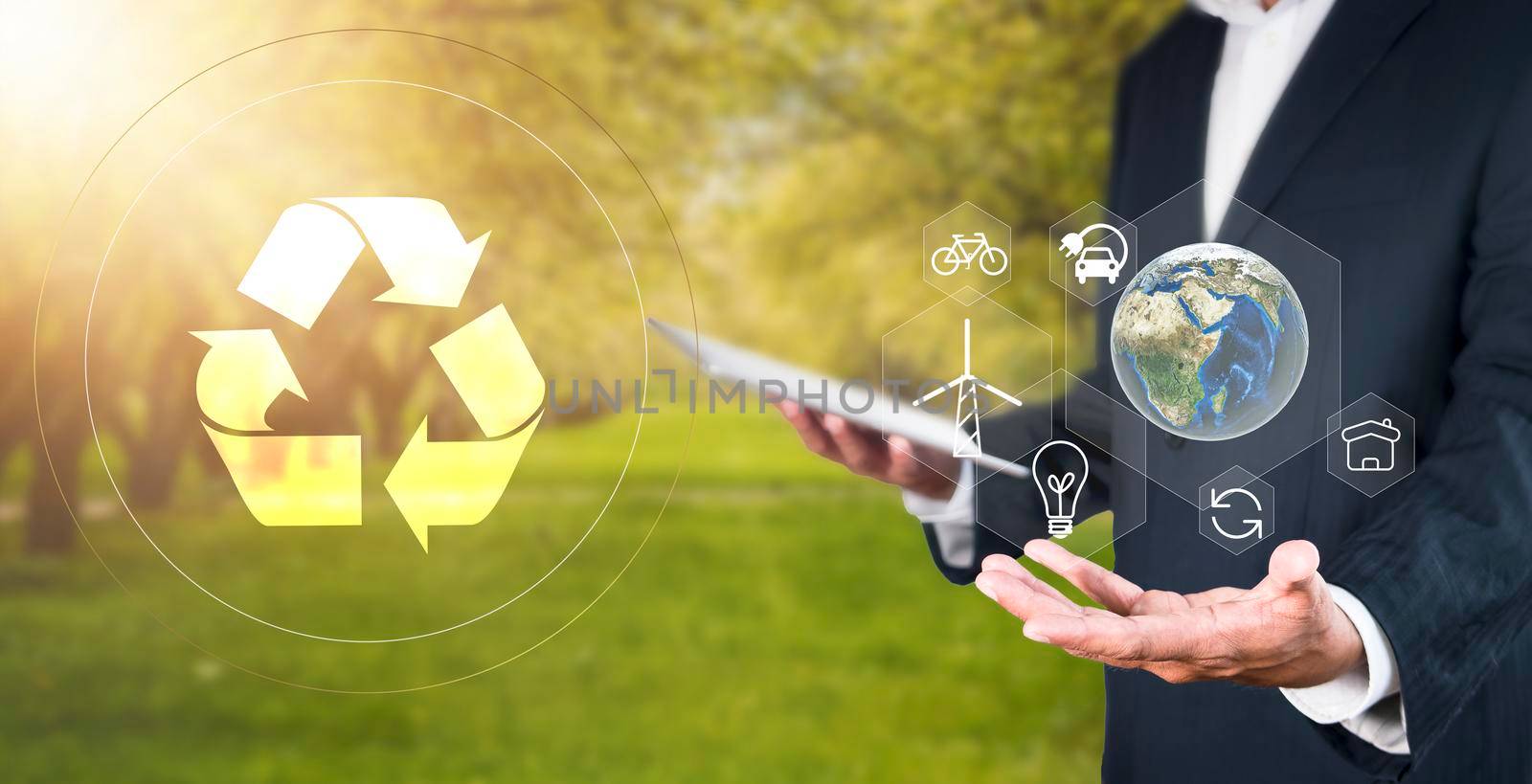 Environment concept Business man hold and show global with eco icon. business man using tablet to analyze environmental conservation industry Environmental protection business for a sustainable future