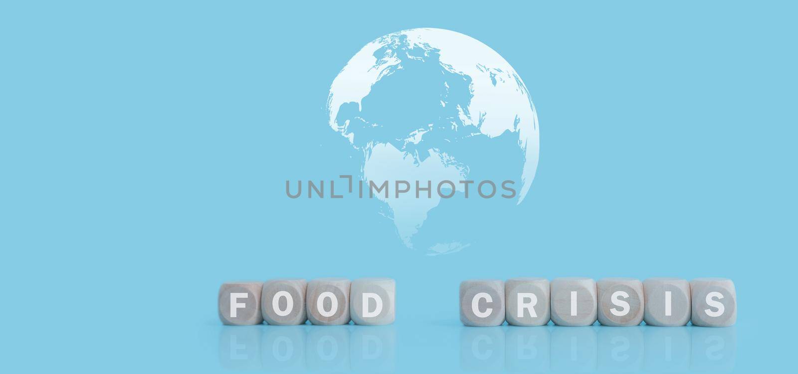 Global food crisis concept. Food crisis words on wooden cubes with earth map on blue background. Background for food crisis issue. Human catastrophe in global food crisis. Earth image provided by Nasa