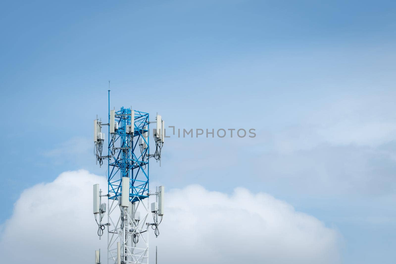 Telecommunication equipment for 5g radio network. Telecommunication tower. Antenna for wireless network. Broadcasting tower for internet communication. Broadcast antenna. Cell phone 5g antenna.