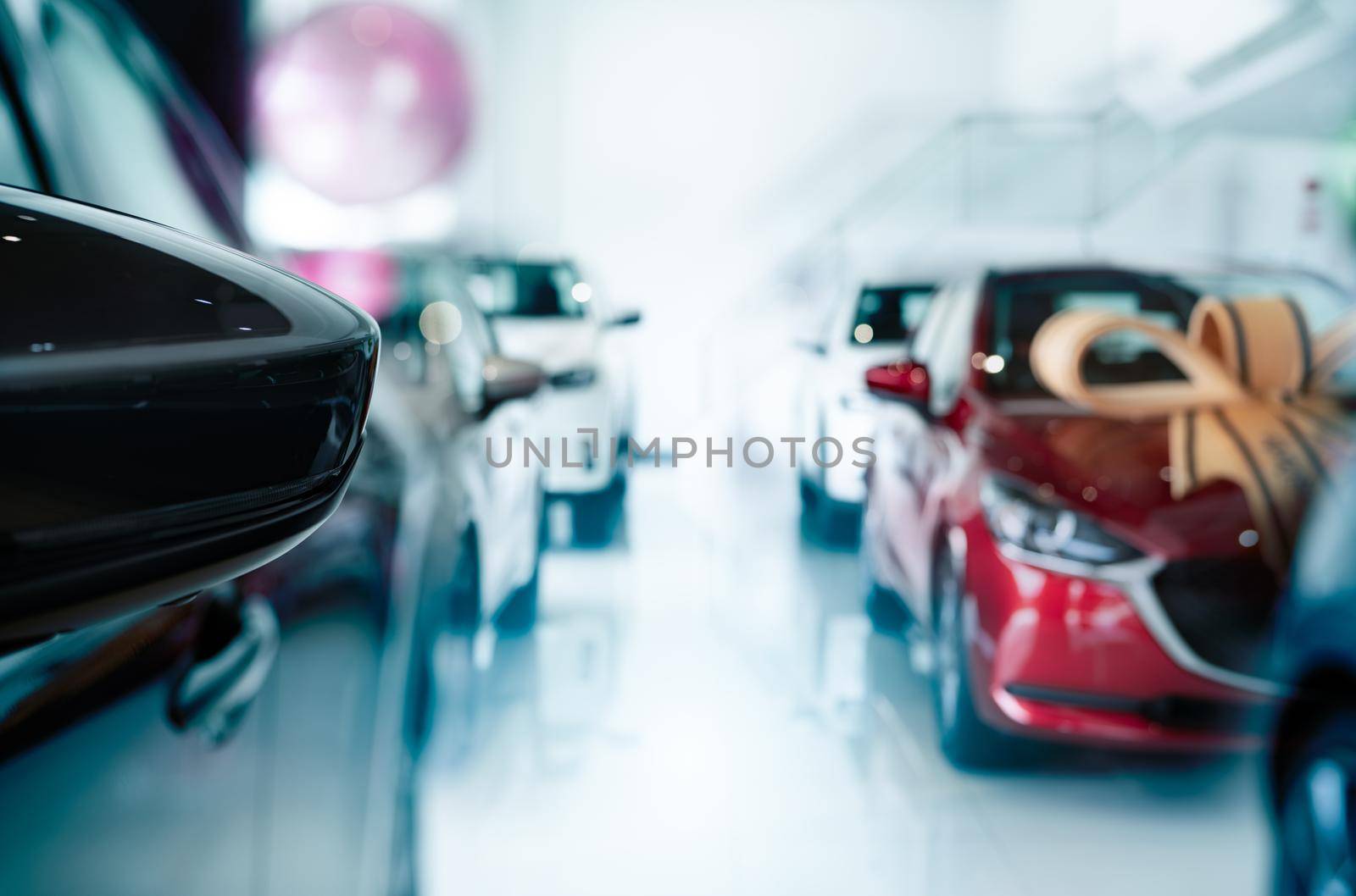 Car parked in luxury showroom. New car parked in modern showroom. Car dealership office. Automobile leasing and insurance concept. Automotive industry. Auto leasing business. Electric vehicle dealer. by Fahroni