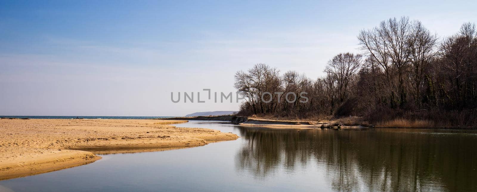 Panoramic view of large estuary of the Kamchia River, flowing into the Black Sea, Bulgaria by EdVal