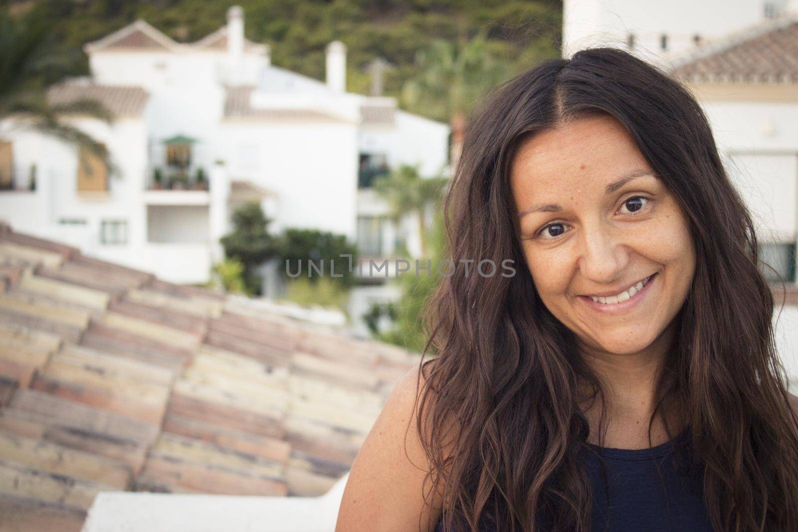 Portrait of youthful woman on mountain background by GemaIbarra