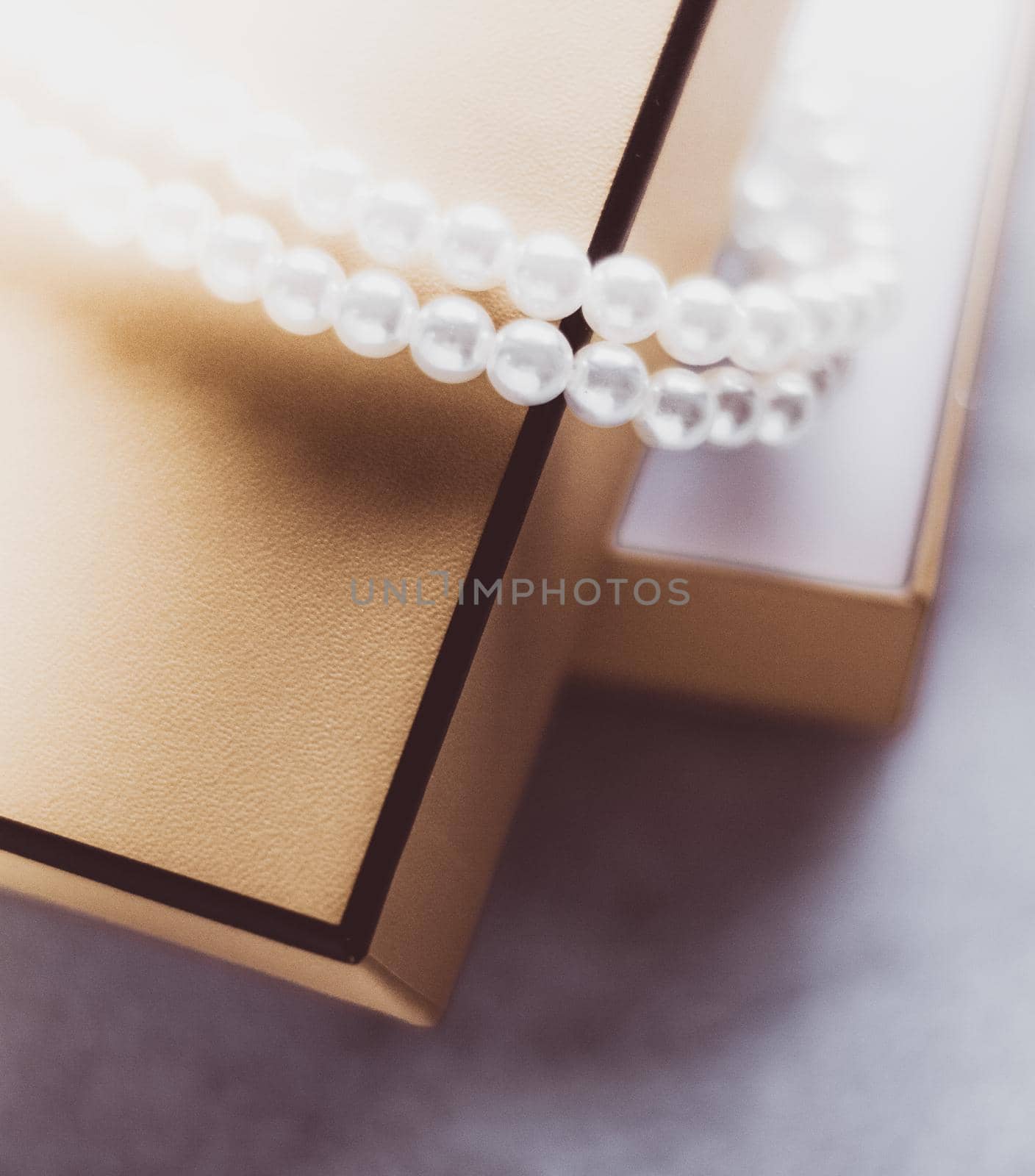 Valentine's day ideas, luxury shopping and holiday inspiration concept - Pearl jewellery in a vintage golden gift box