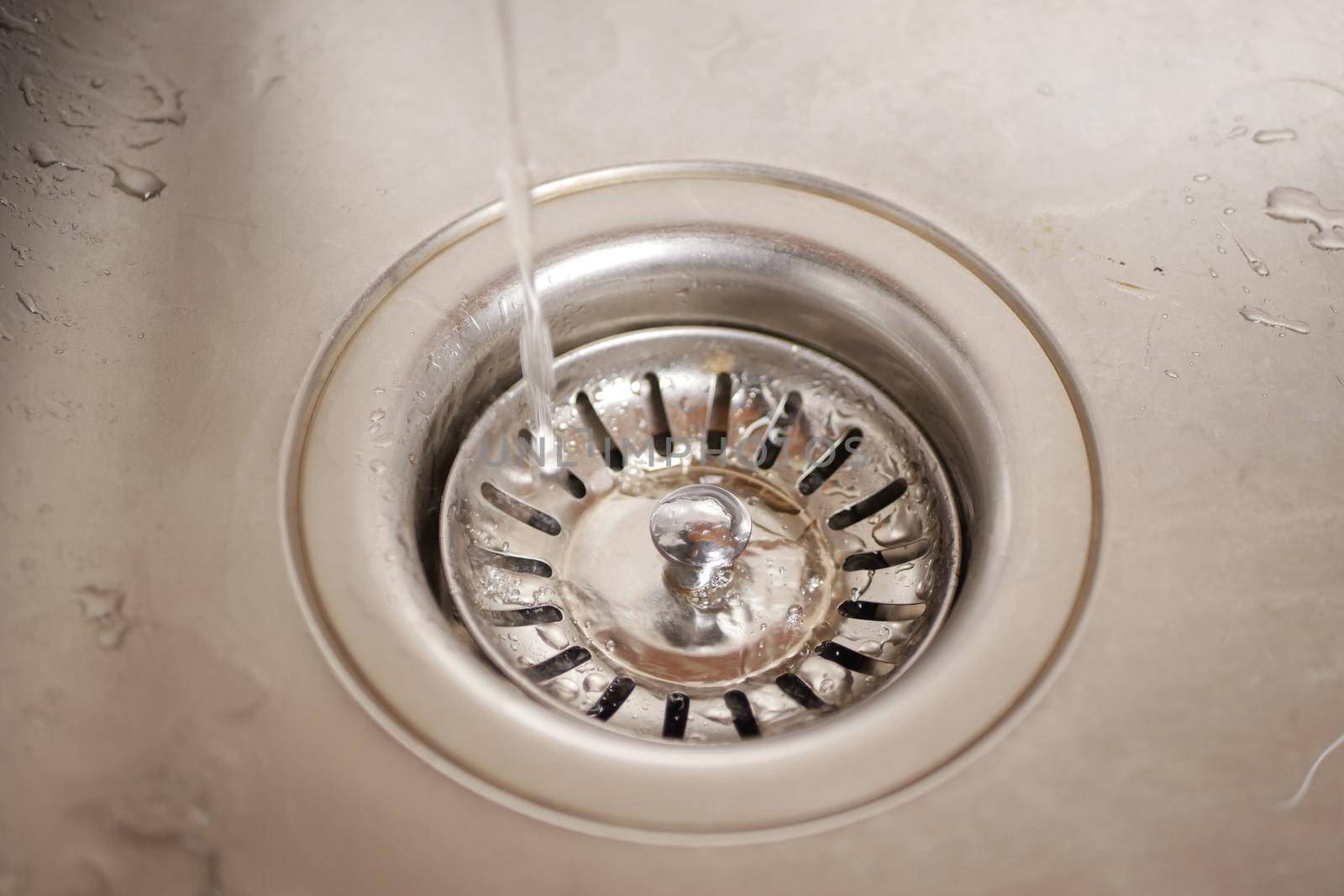 Faucet with flowing water closeup