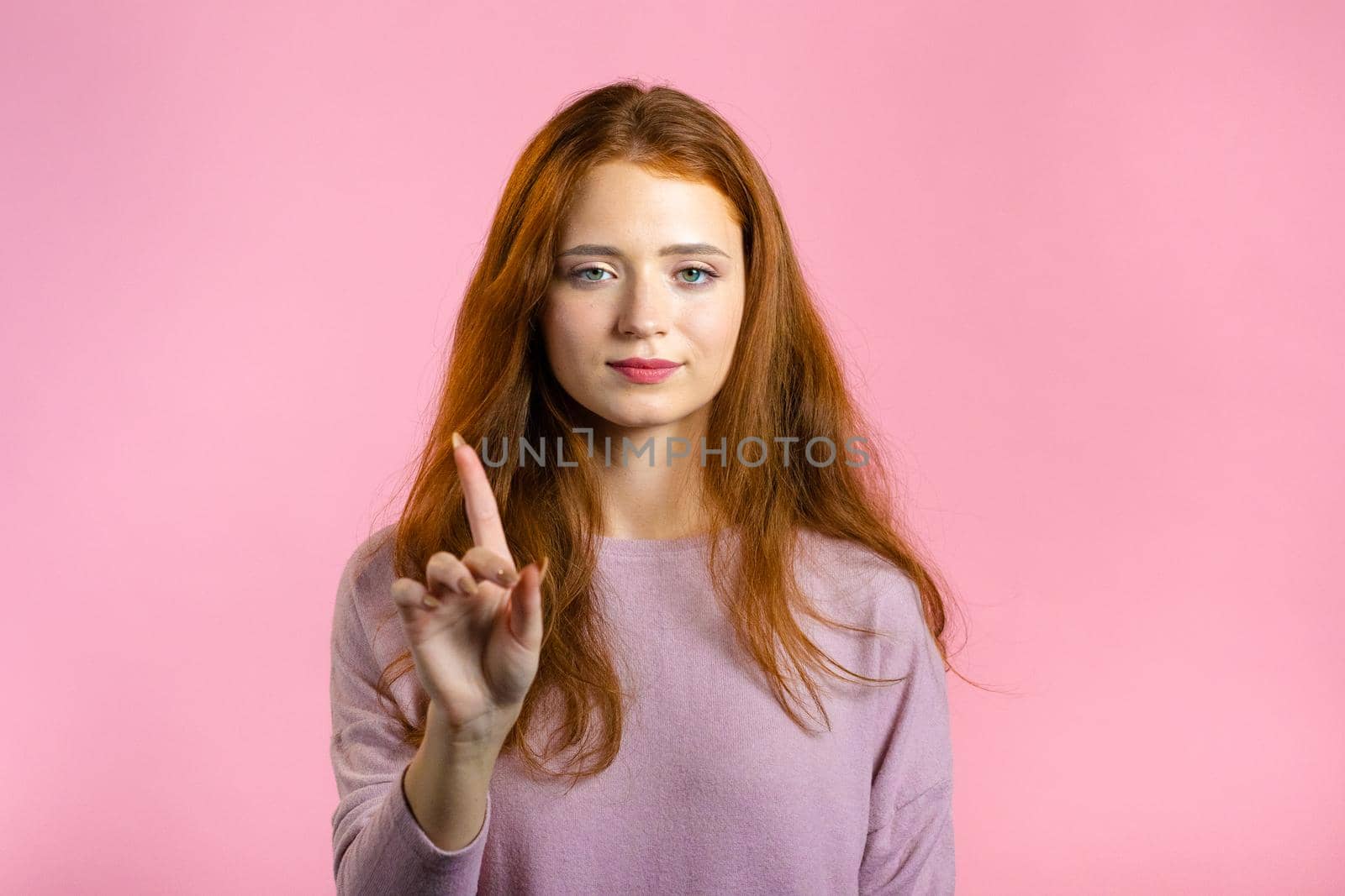 Woman disapproving with No finger Sign Make Negation Finger Gesture. Attention, Denying, Rejecting, Disagree, Portrait of Beautiful lady.