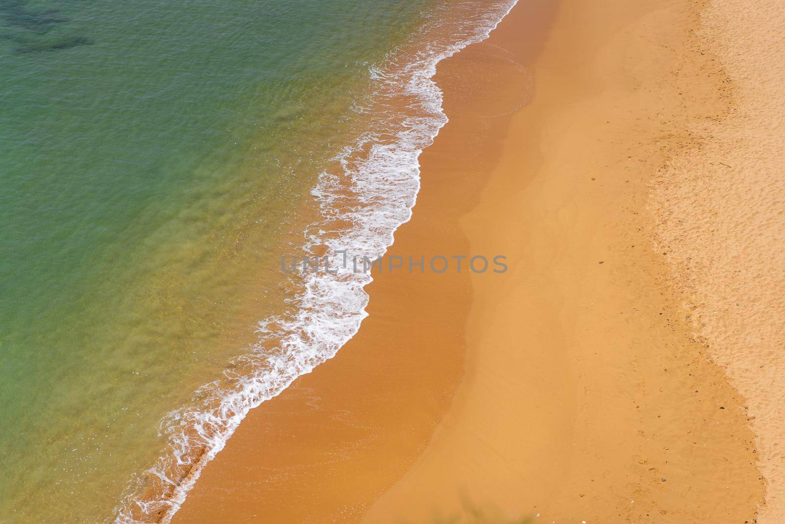 Aerial view of sea waves and sandy beach Atlantic ocean seashore
