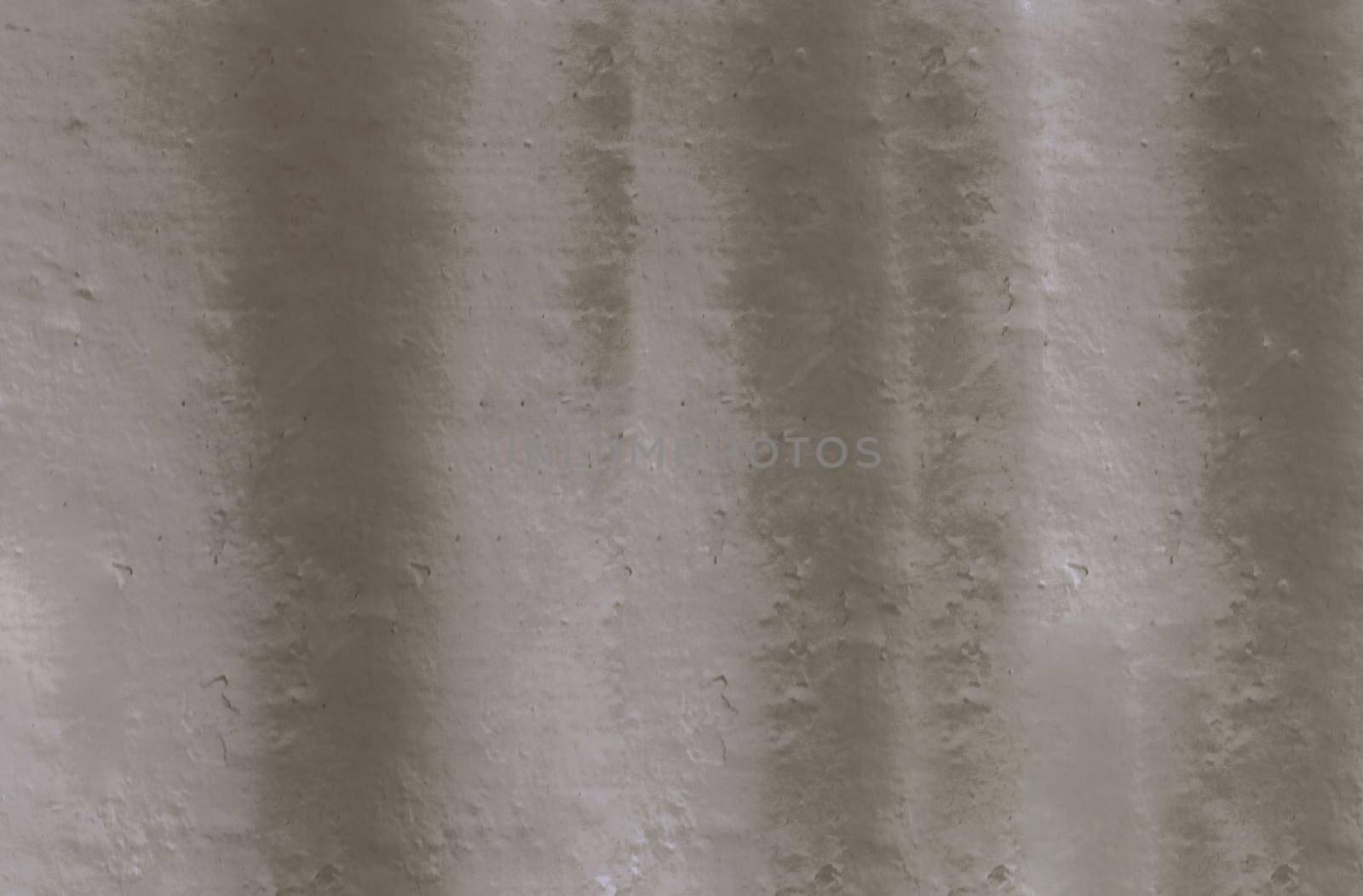 Texture from a relief gray wall.