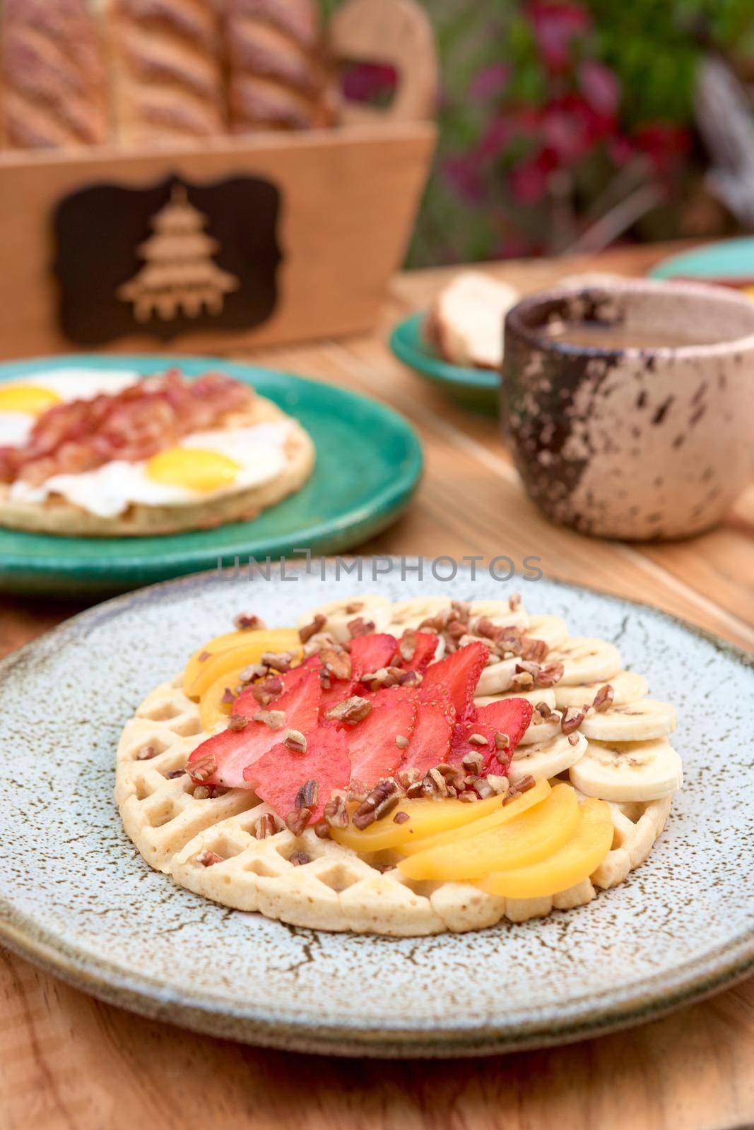 delicious waffle on wooden table. delicious breakfast waffle.