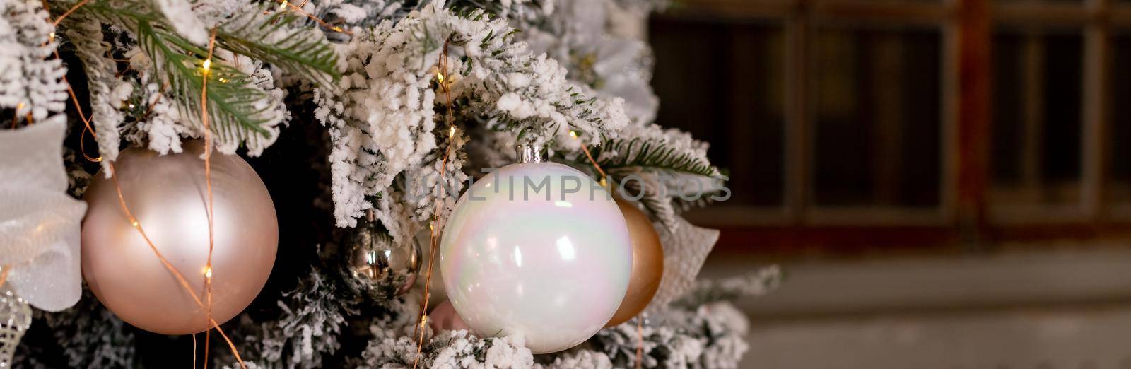 white delicate Christmas tree and Christmas decorations, balls and ribbons, garland and lights. Pink pearl pearl pastel color.New year greeting card. merry Christmas by YuliaYaspe1979