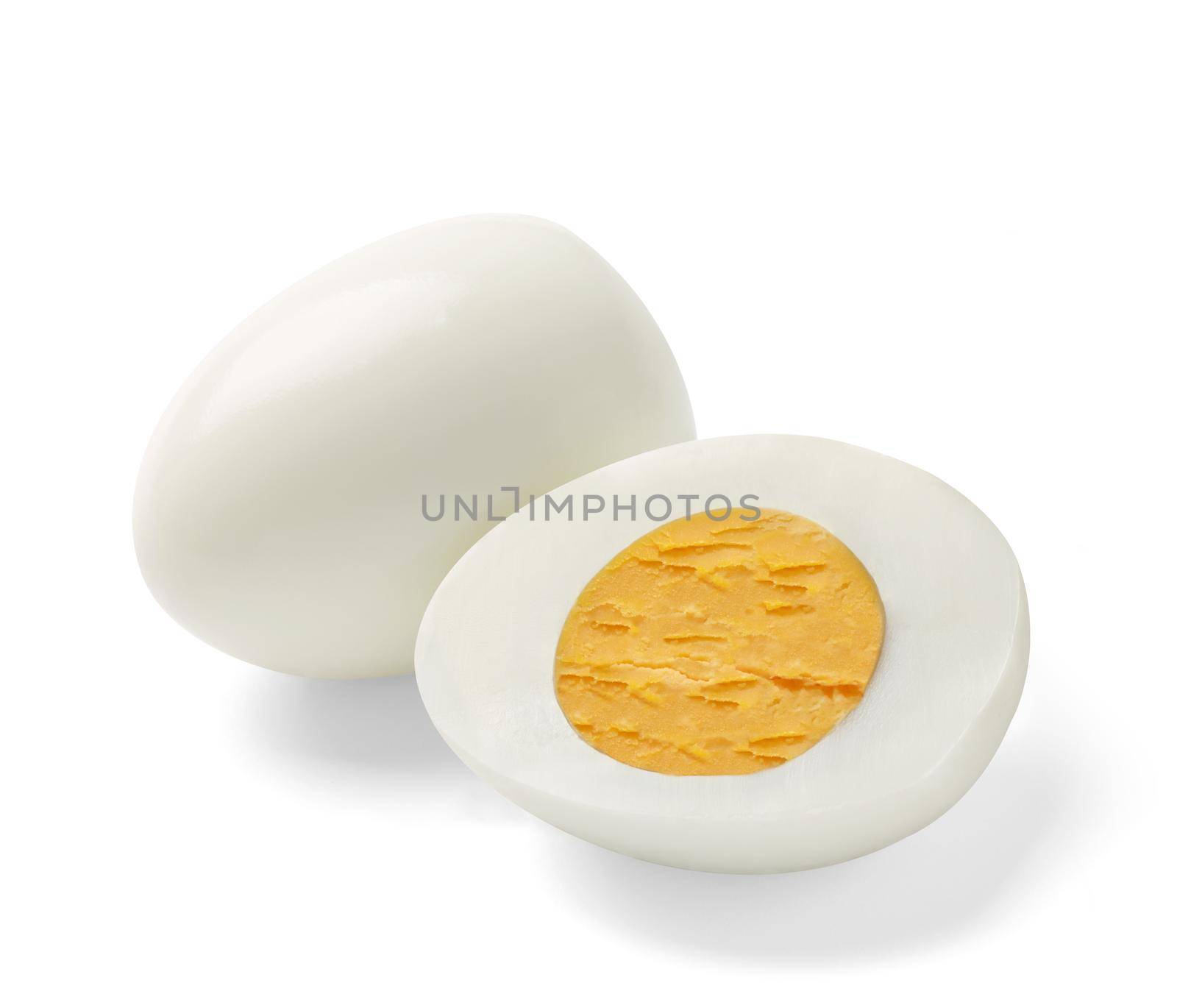 Close up of a boiled egg on white background