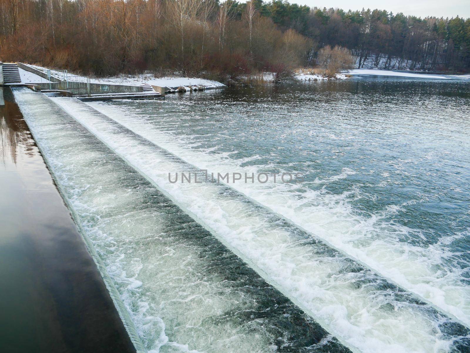 View of the river dam in spring. The river scenery.