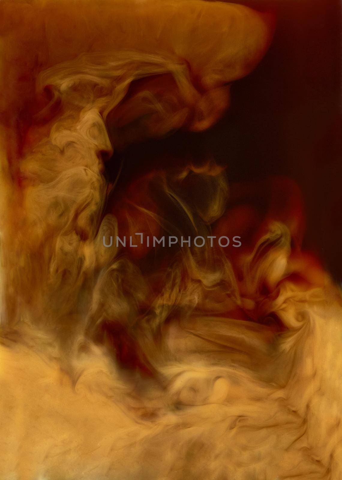 Close up of coffee and milk mixing in a glass cup background