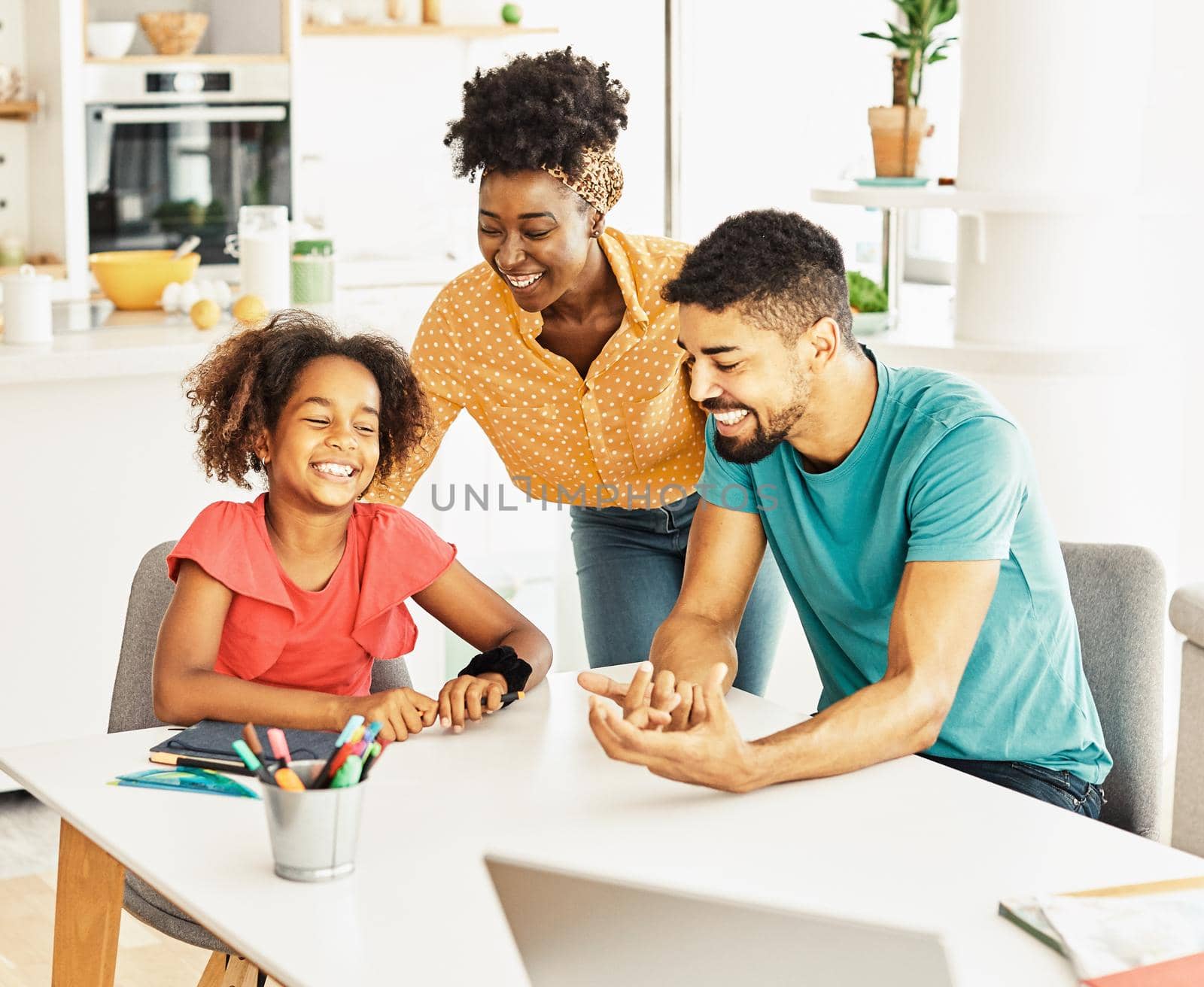 Family with daughter having fun at home