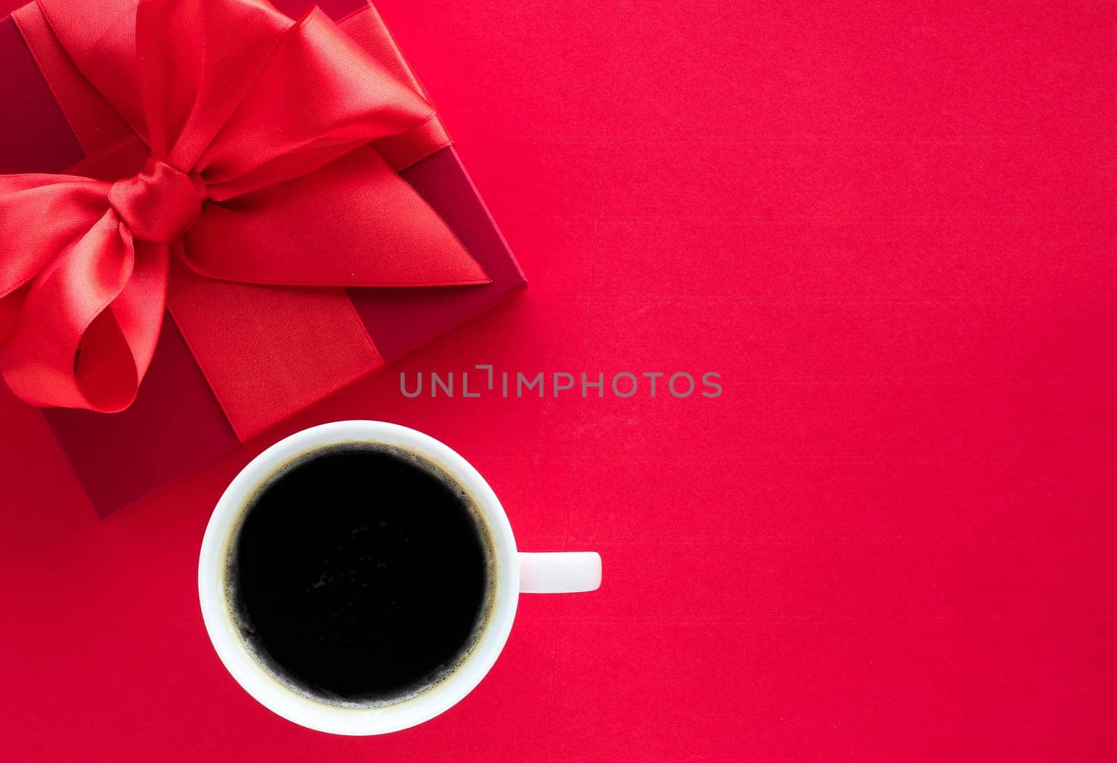 Romantic celebration, lifestyle and birthday present concept - Luxury beauty gift box and coffee on red, flatlay