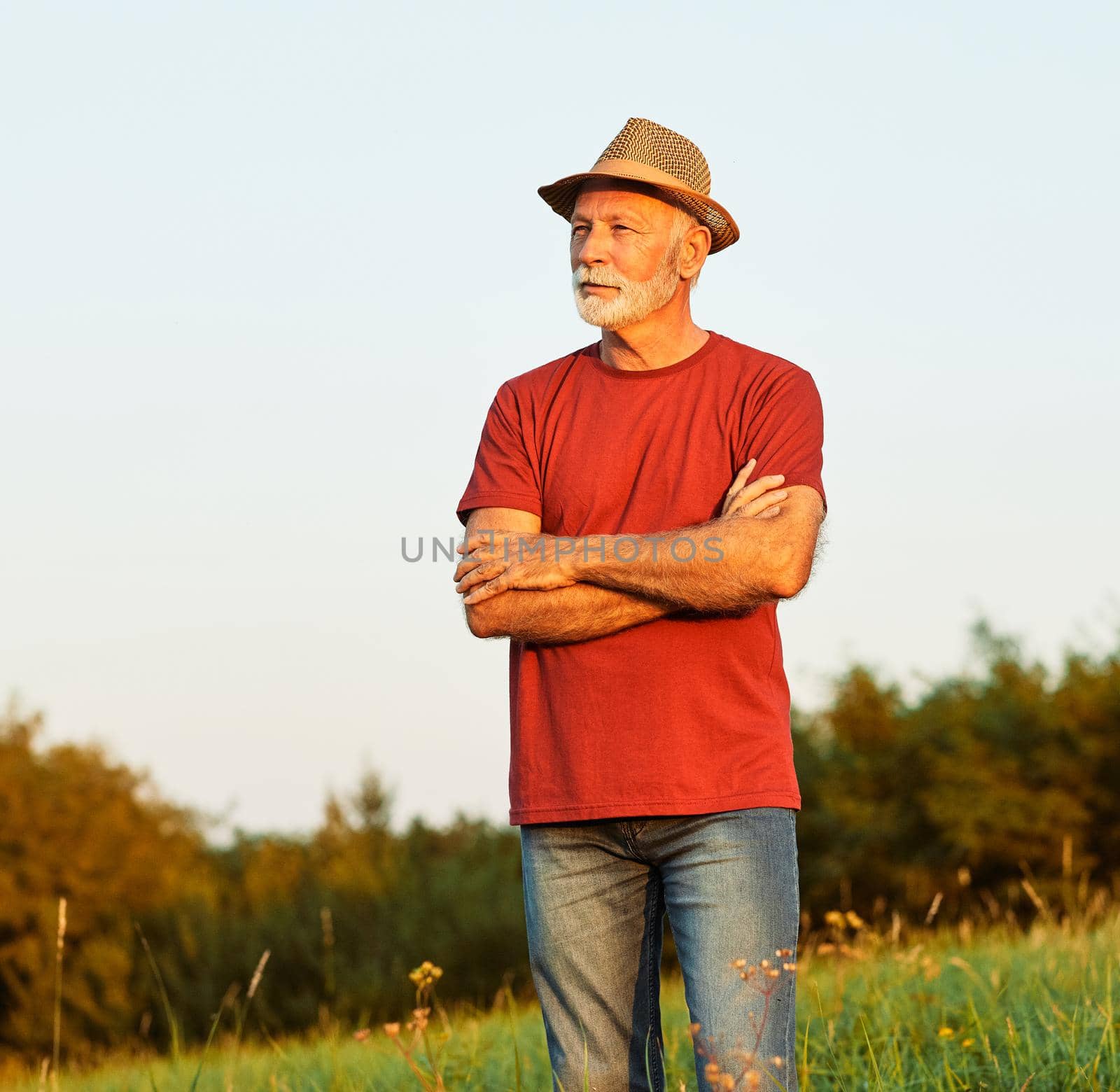 portrait senior man elderly old retirement mature gray hair farm farmer outdoor healthy active retired hat by Picsfive