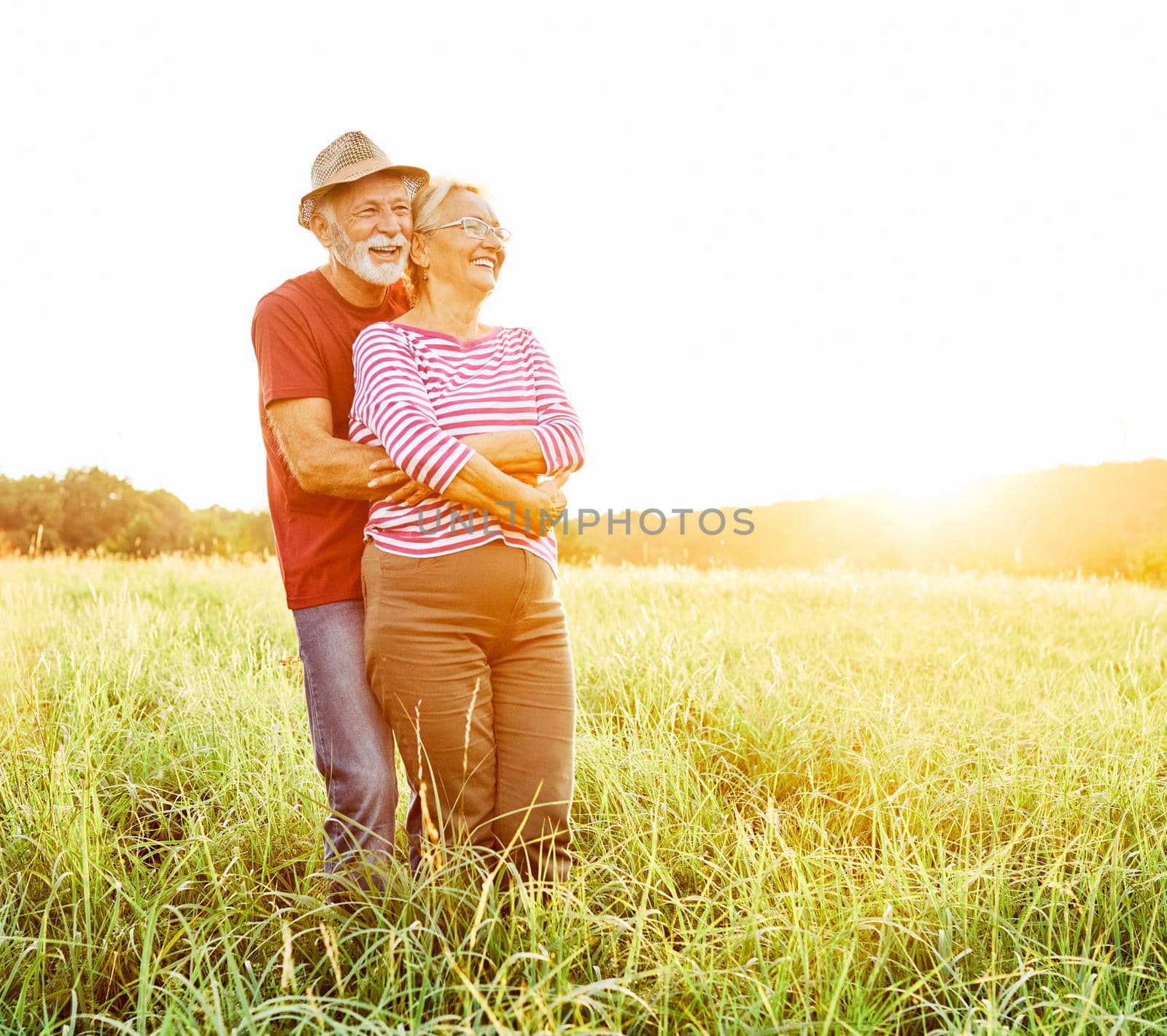 Happy active senior couple outdoors