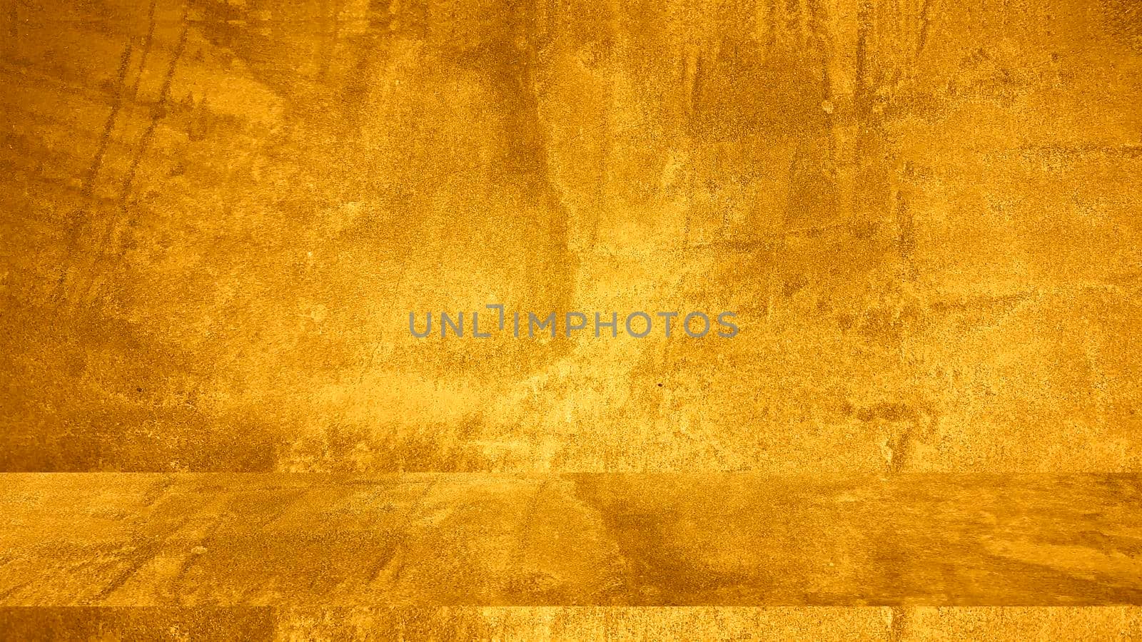 Texture of golden decorative plaster or concrete. Abstract grunge background for design by Benzoix