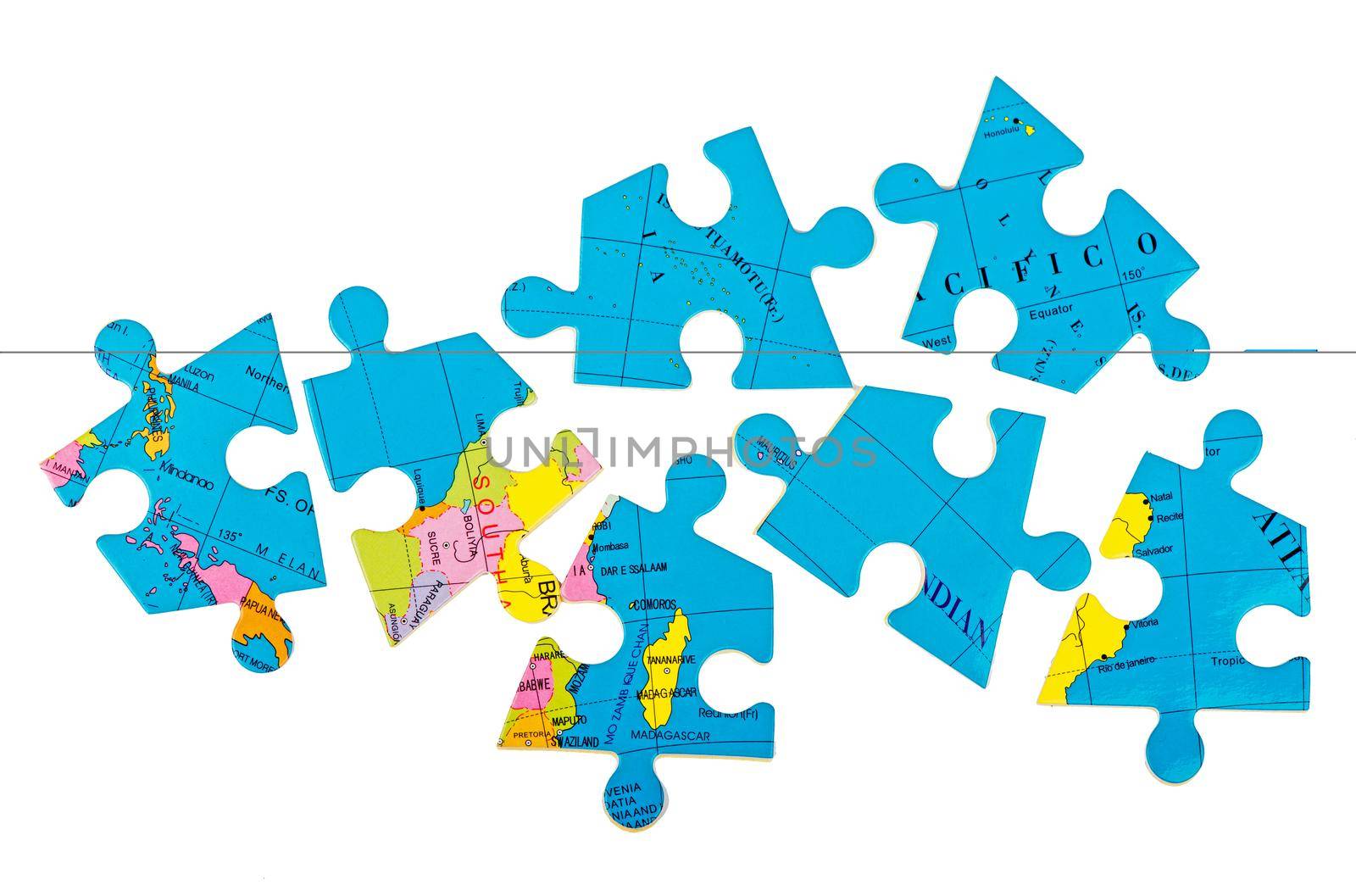 globe puzzles. Concept of Globalization. Earth puzzle on white background by aprilphoto