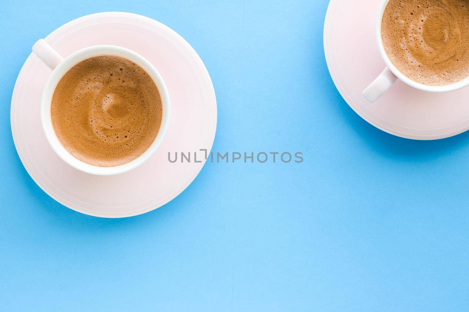 Breakfast, drinks and modern lifestyle concept - Hot aromatic coffee on blue background, flatlay