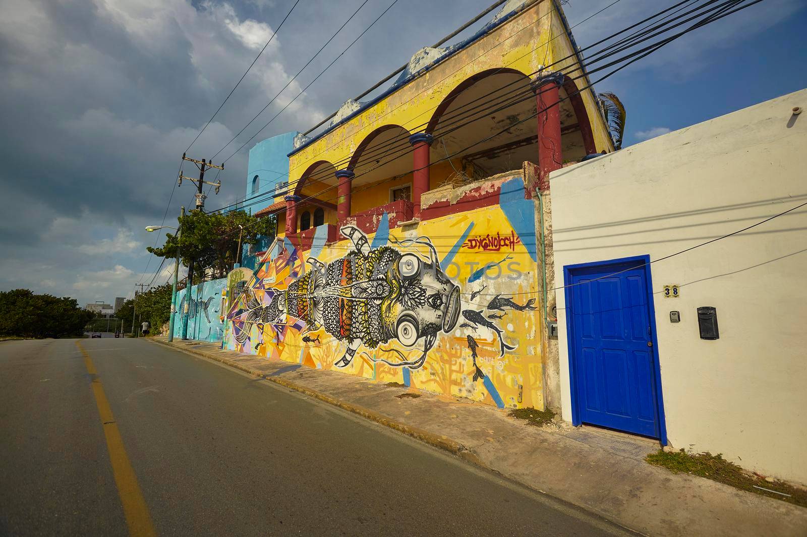 Isla Mujeres, Mexico 20 august 2022: Beautiful colorful graffiti decorates a lost building in Isla Mujeres in Mexico