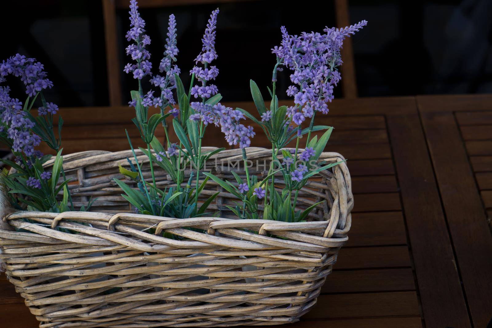 wicker basket with decorative lavender bouquet by joseantona