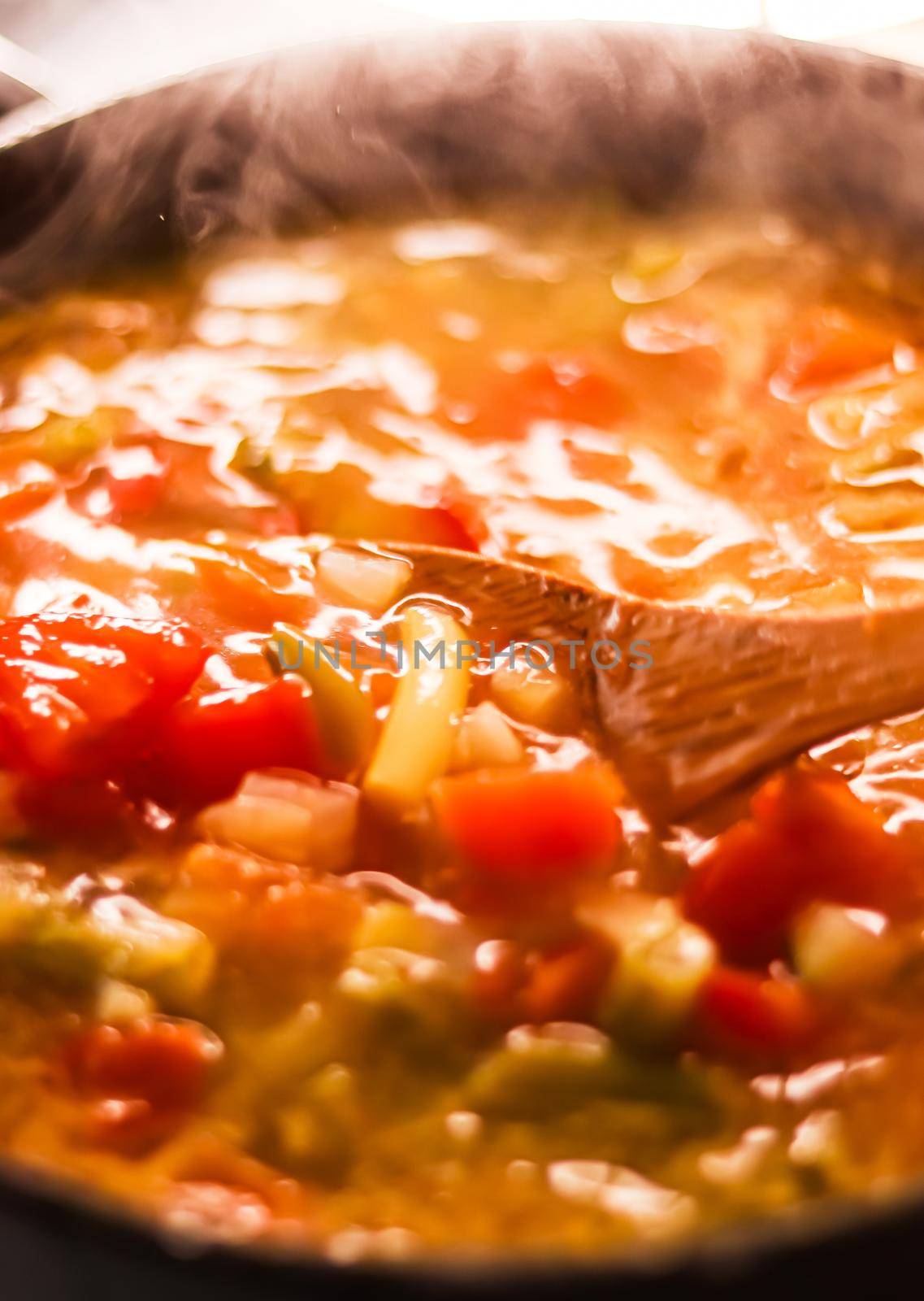 Cooking vegetable soup in saucepan, comfort food and homemade meal concept