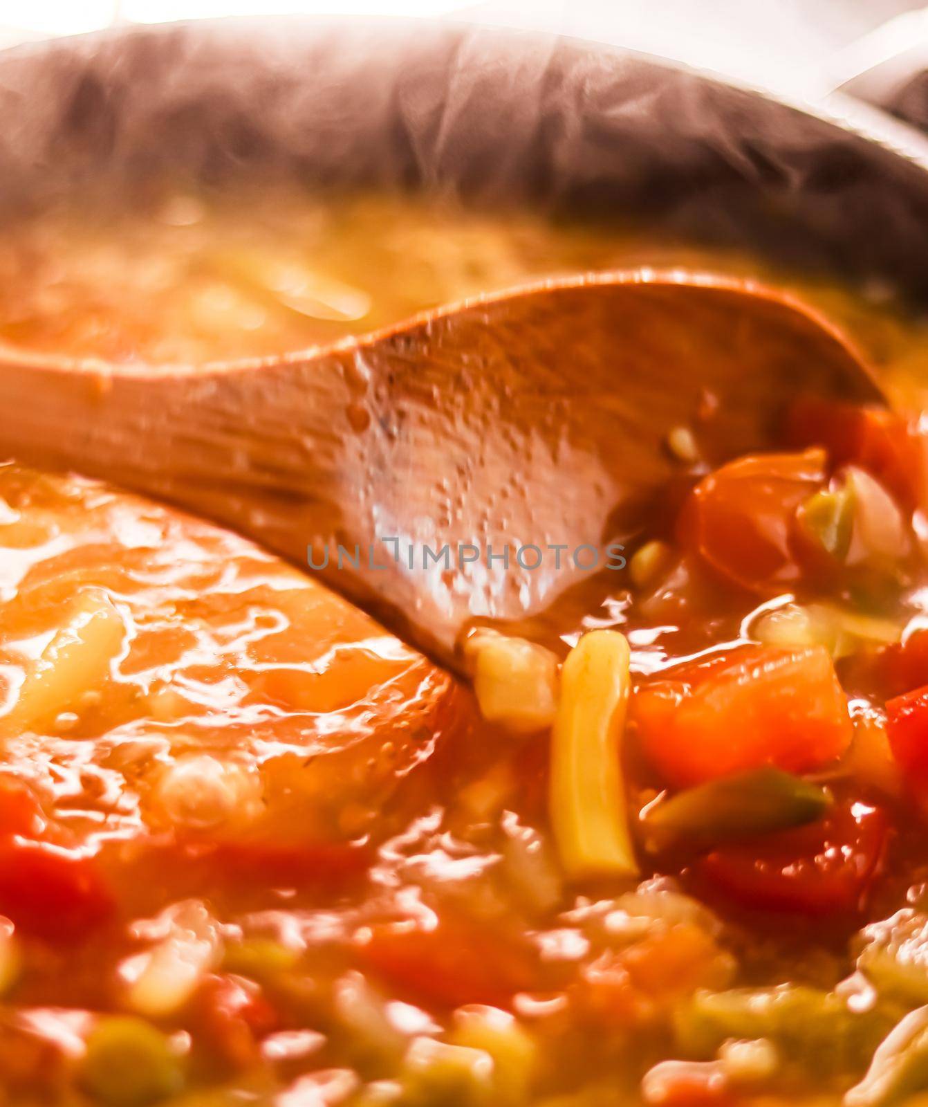 Cooking vegetable soup in saucepan, comfort food and homemade meal concept