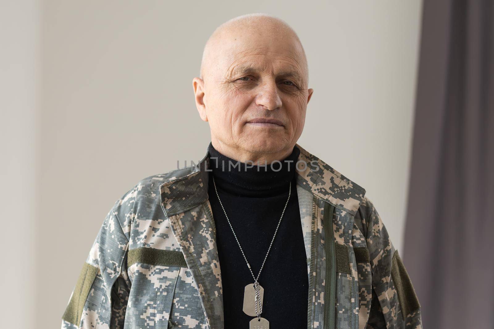 Elderly military officer isolated on white background.