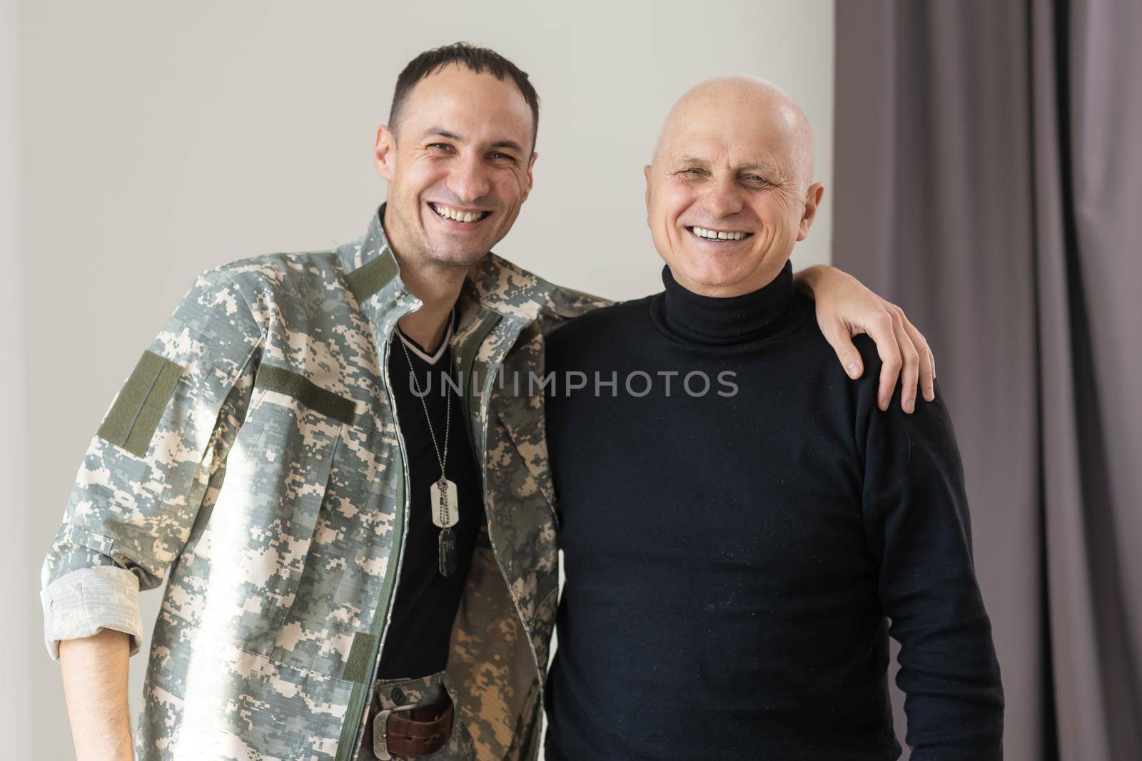 Soldier reunited with his parents.