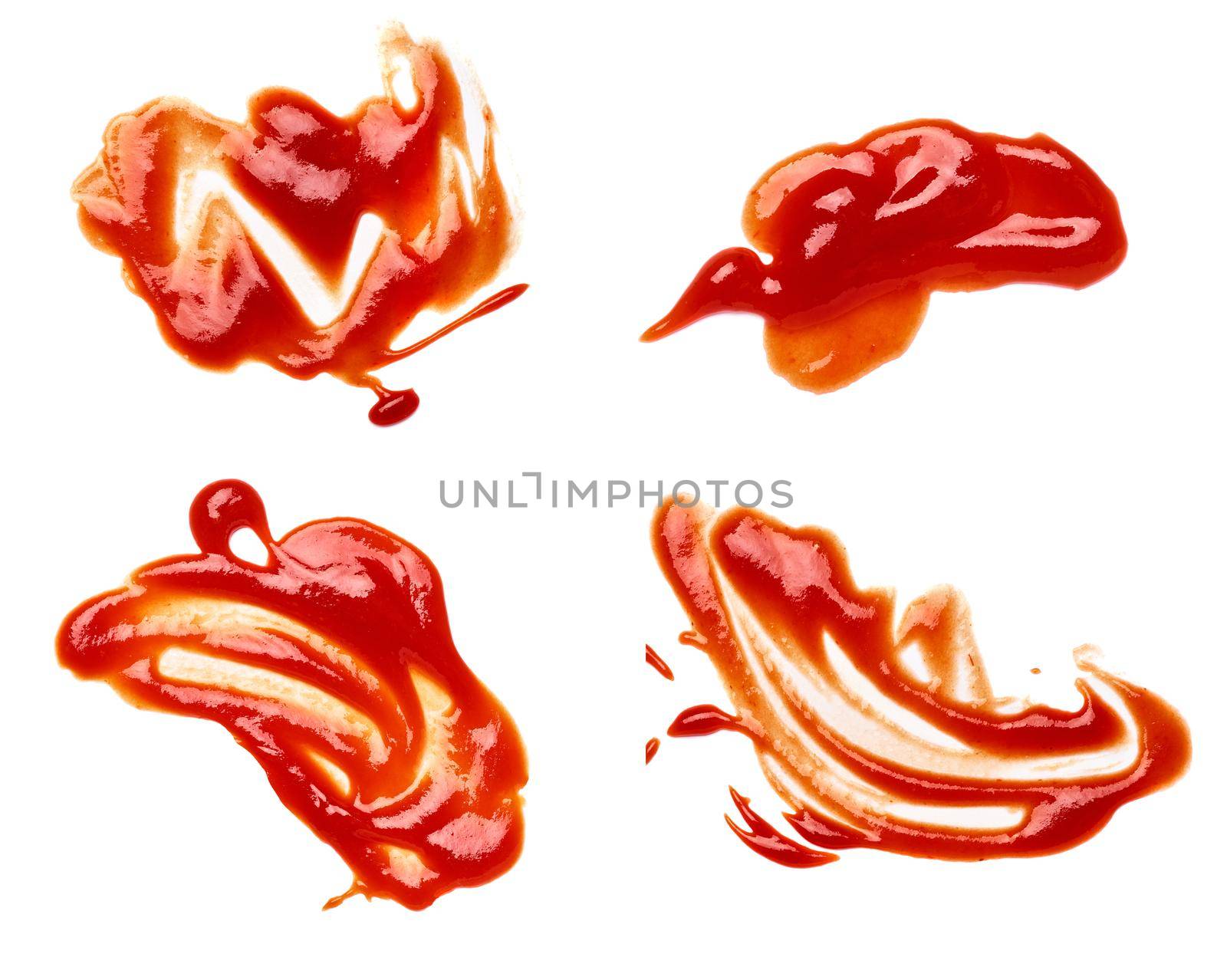 close up of a ketchup stain on white background